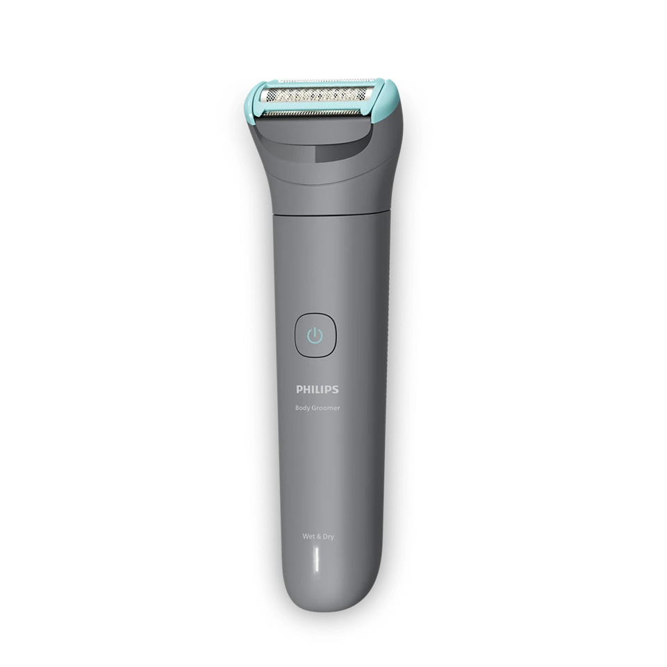 Rifinitore corpo Philips grigio con testina di taglio blu, pulsante di accensione e indicazione "Wet & Dry".