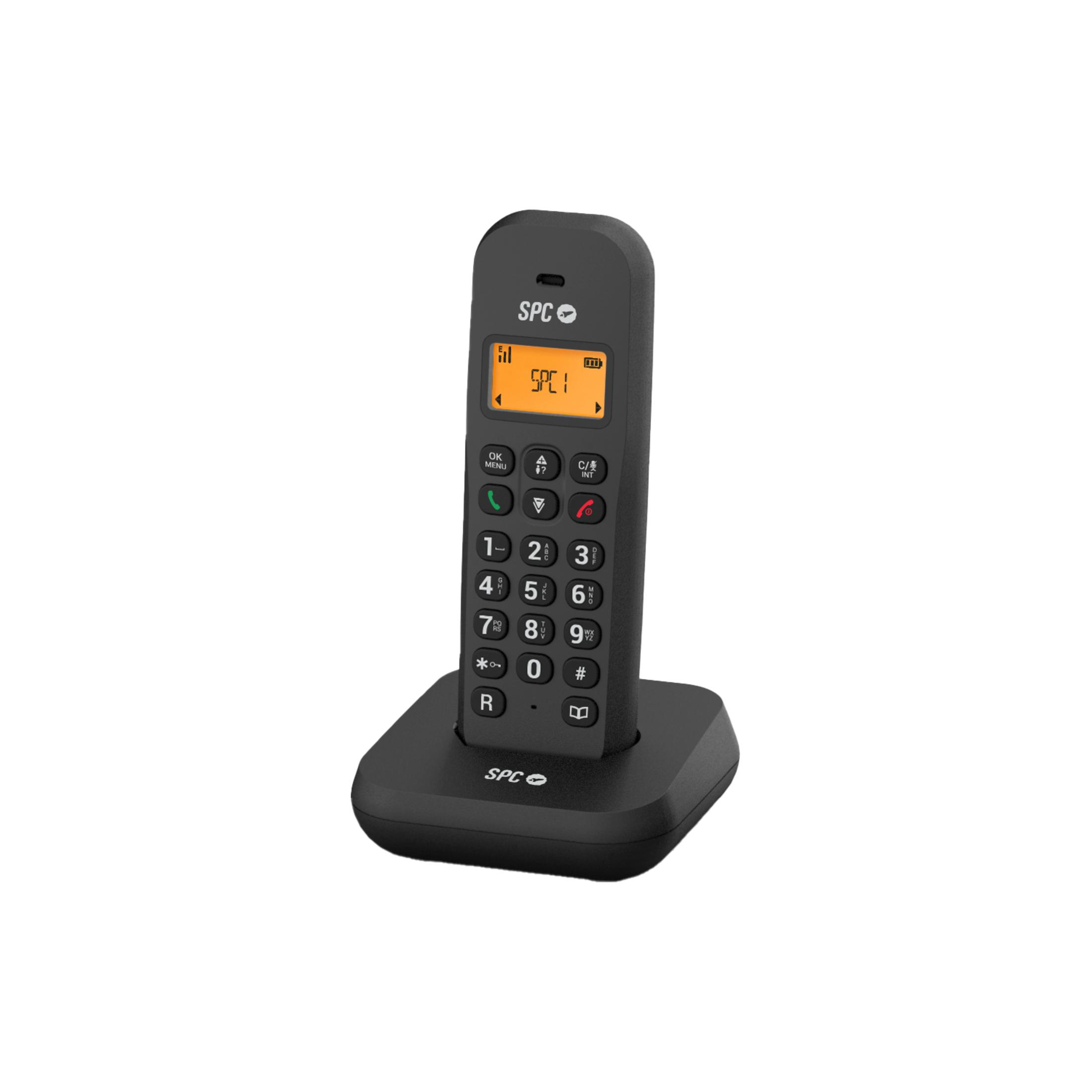 Un telefono cordless nero è sulla sua base di ricarica.