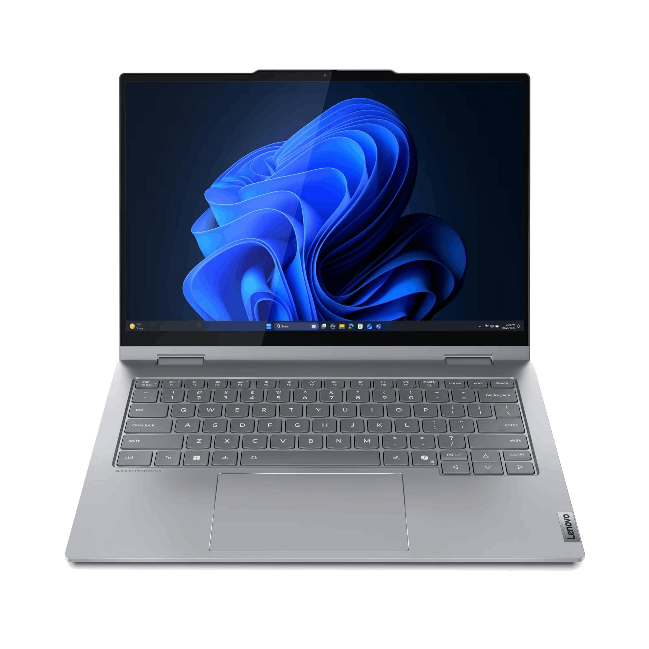 Un laptop argentato con tastiera retroilluminata e sfondo blu.
