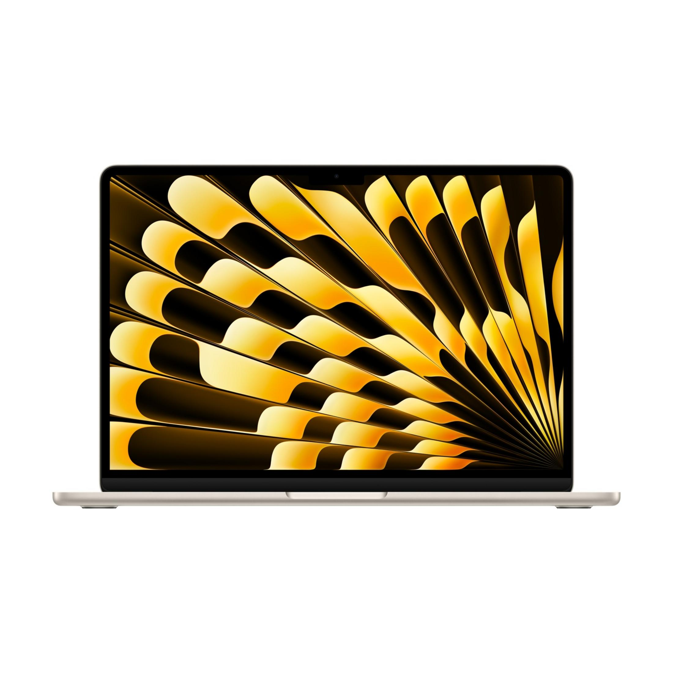 Un laptop di colore chiaro che mostra un motivo di sfondo giallo-arancio a forma di ventaglio.