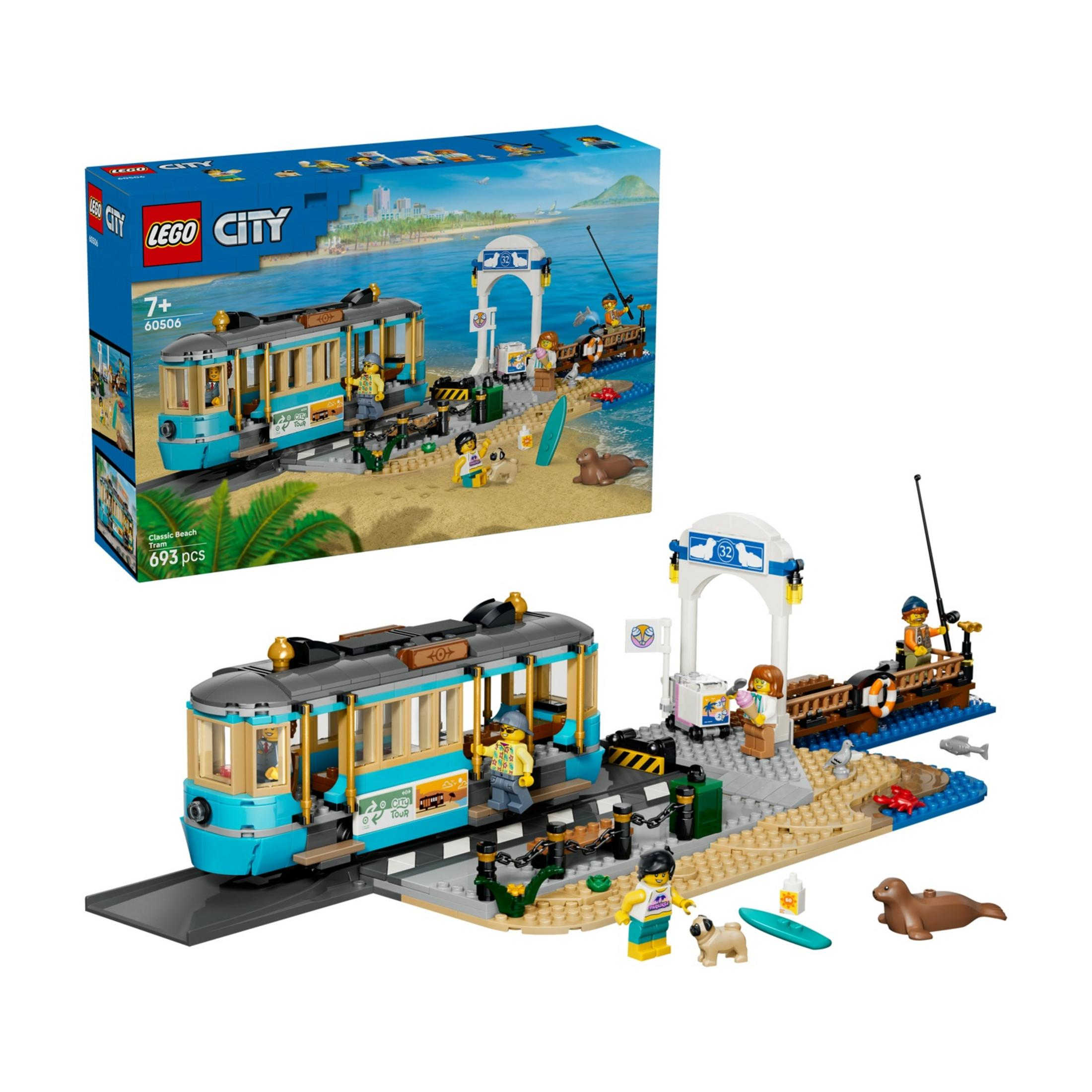 Un set de Lego con un tranvía azul en una playa, figuras, un perro y focas.