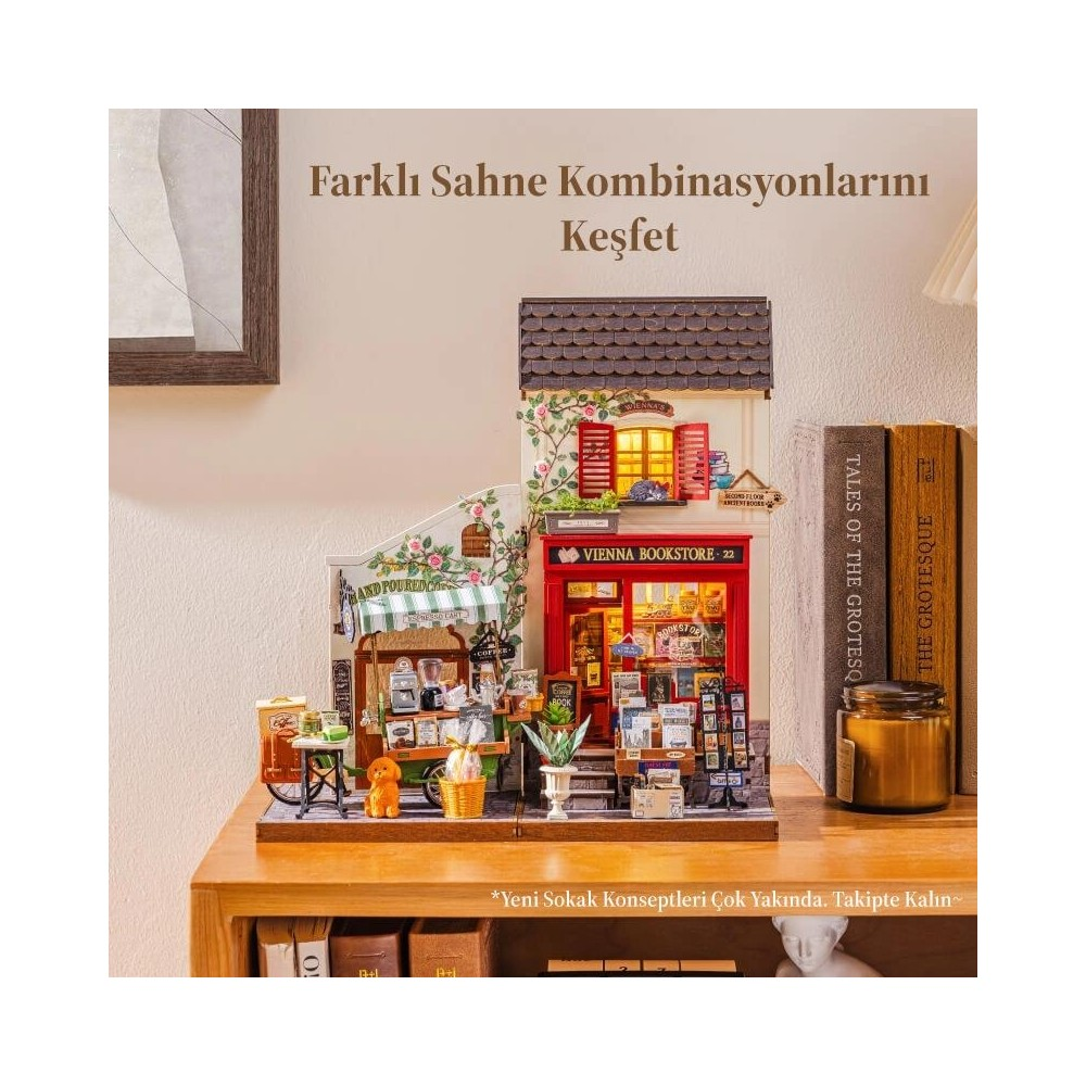 Kitapçı, sokak manzarası ve kitapları içeren detaylı minyatür model.