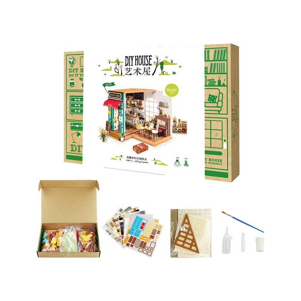 Beyaz arka plan üzerinde model, parçalar, çıkartmalar ve aletler içeren DIY ev kiti.