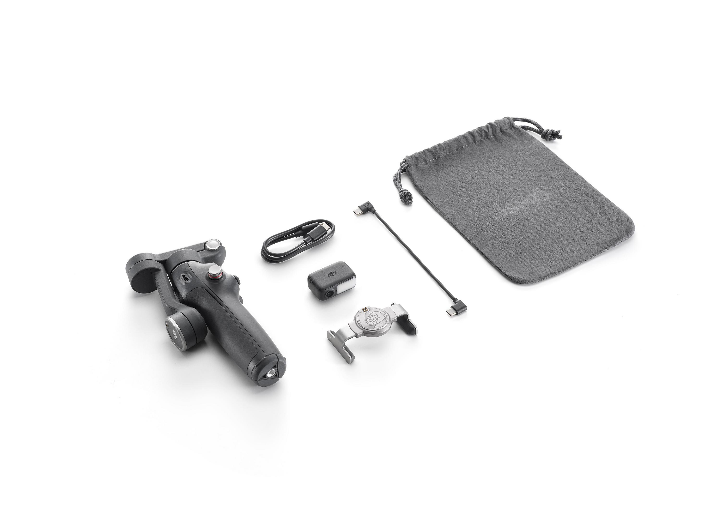 Un gimbal nero con cavi, una piccola luce e una custodia grigia su sfondo bianco.