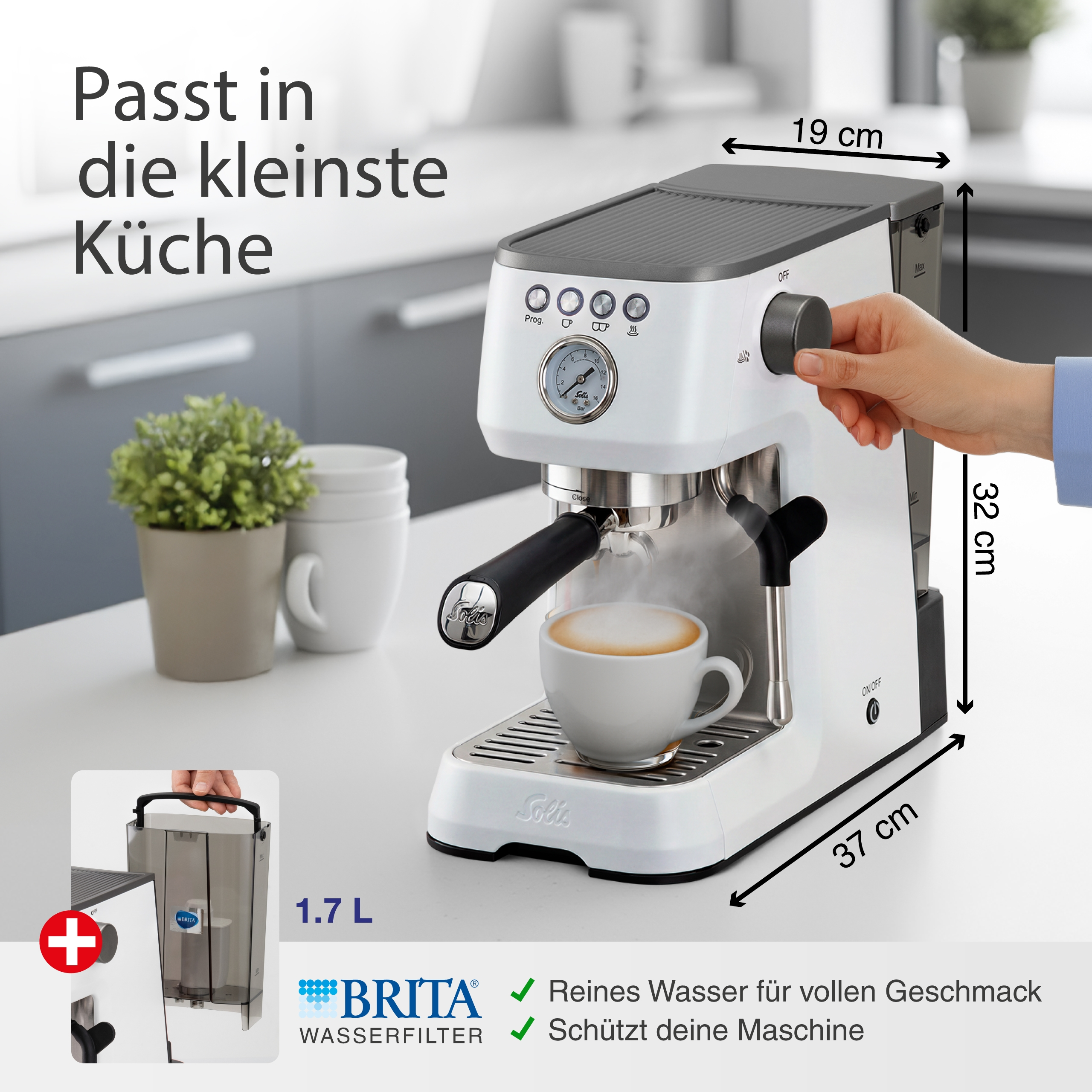 Kompakte Espressomaschine mit Dampf, Tasse und Wasserfilter.