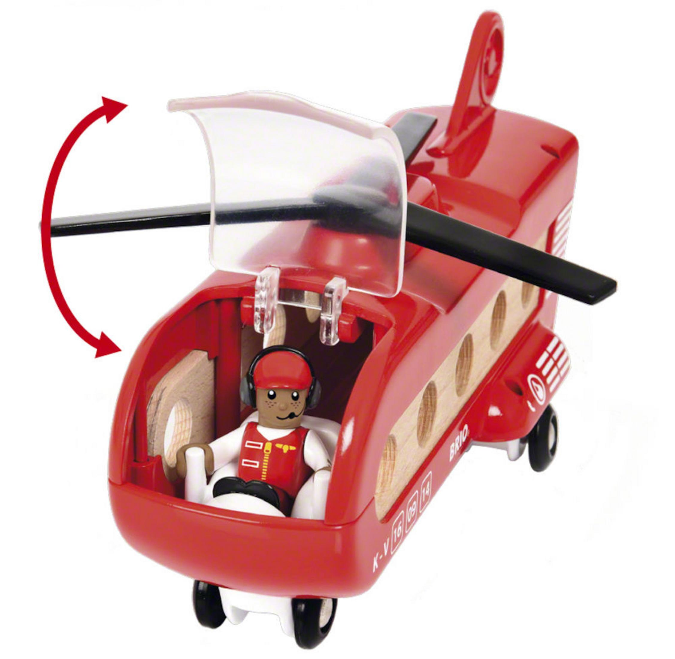 Rotes Spielzeughubschrauber mit Pilot, auf weißem Hintergrund.