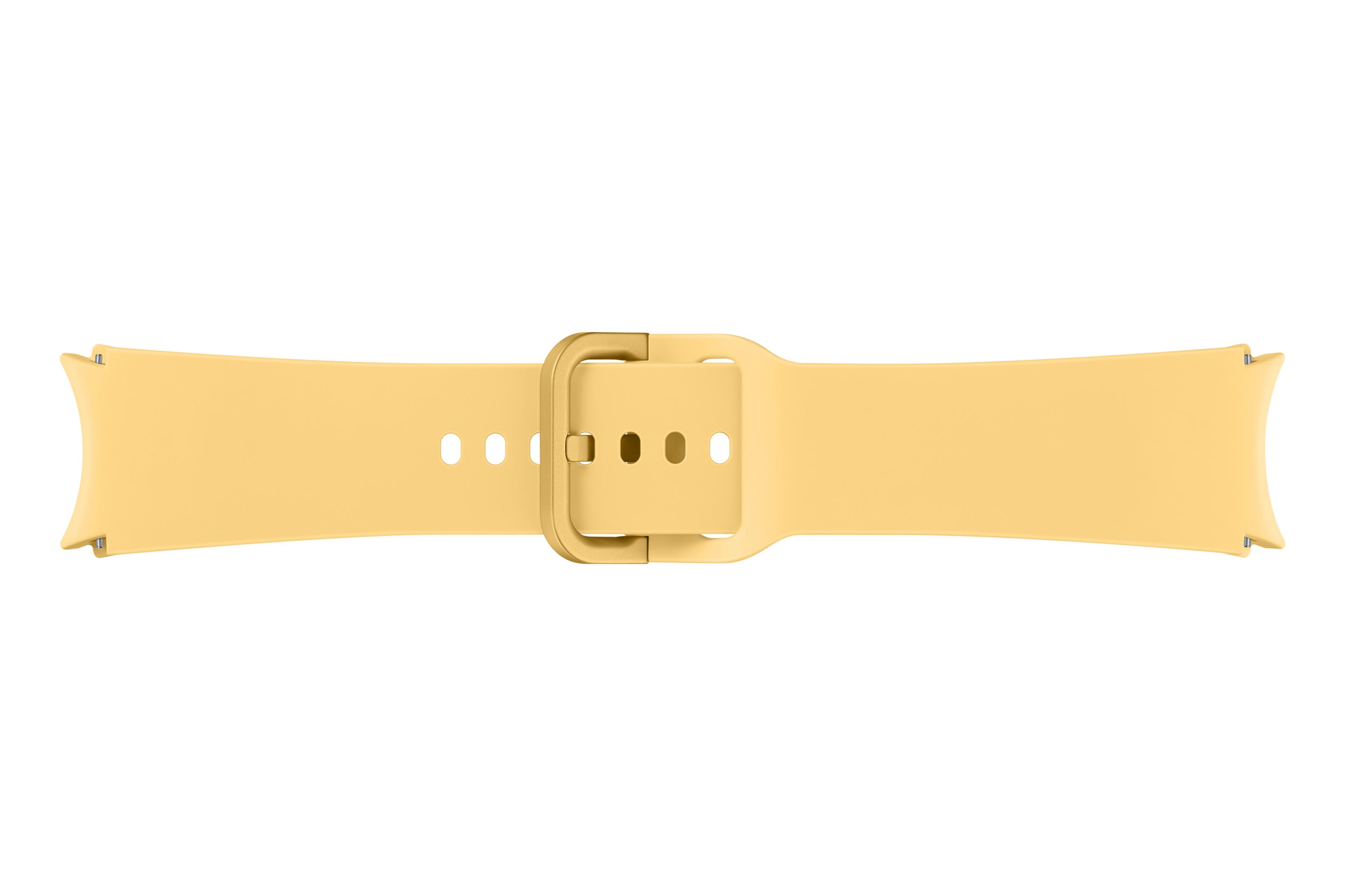 Un cinturino giallo per orologio con fibbia dorata e fori.