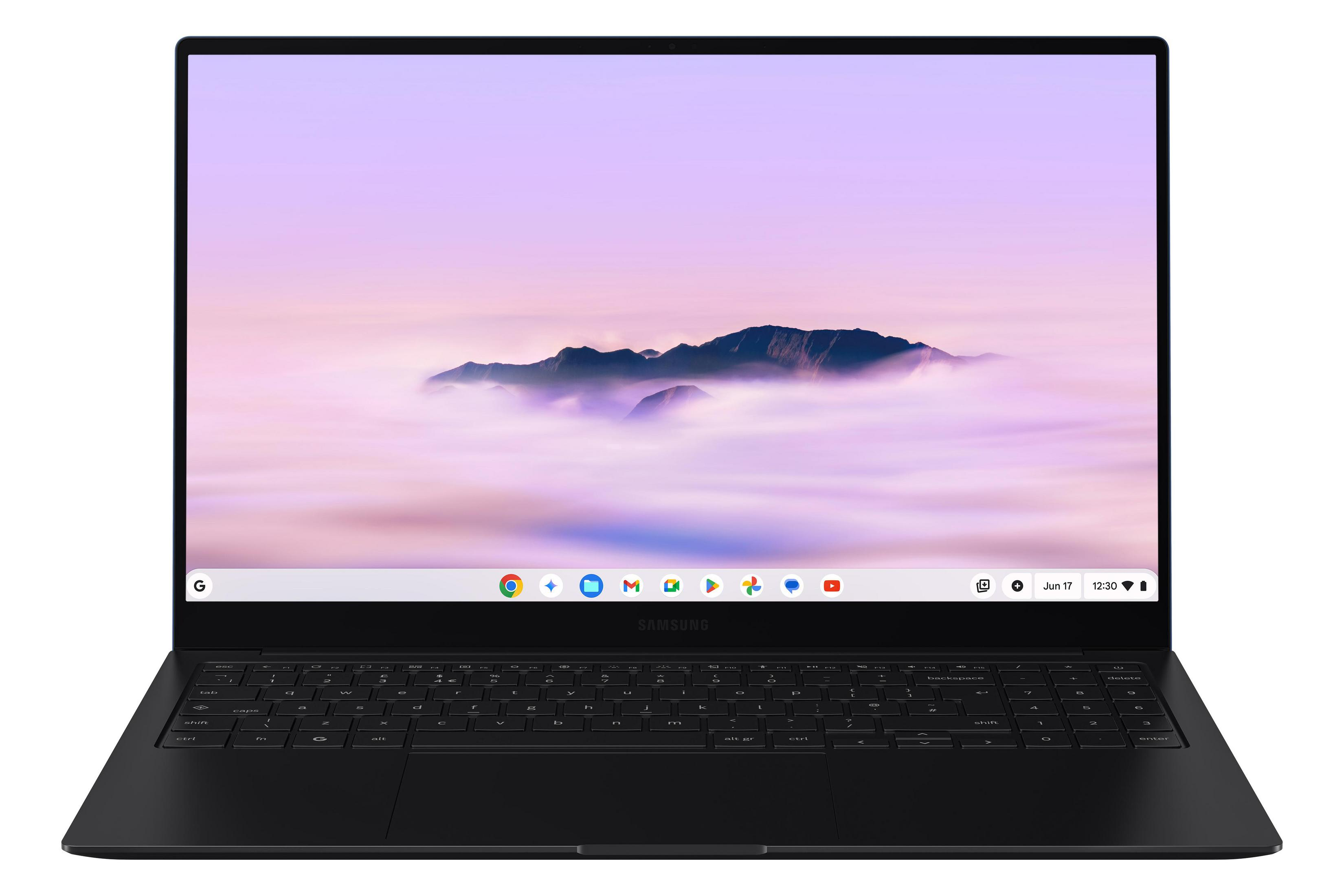 Schwarzer Laptop mit Tastatur und einem Berg-Hintergrundbild.