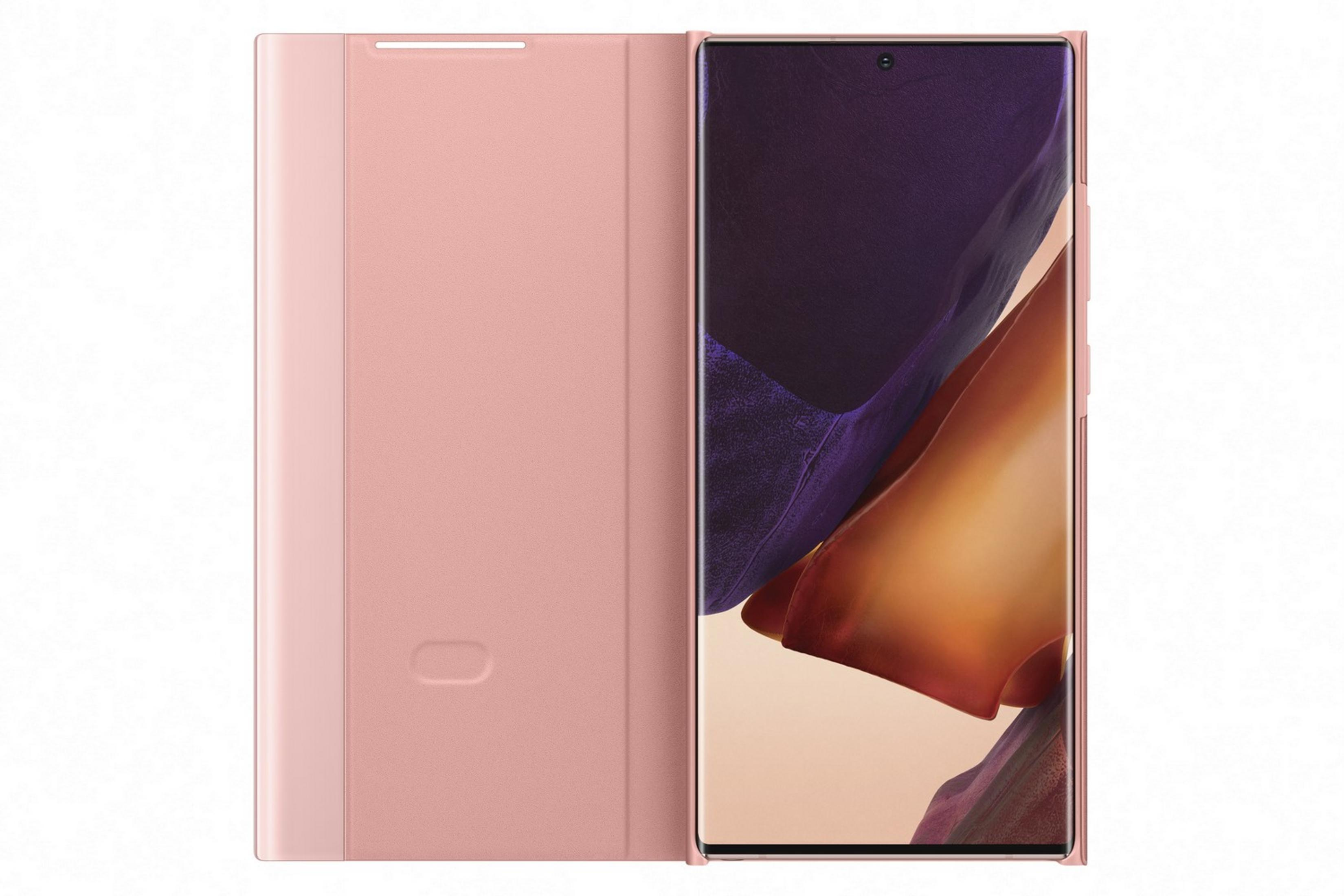 Uno smartphone rosa con una custodia protettiva aperta accanto.