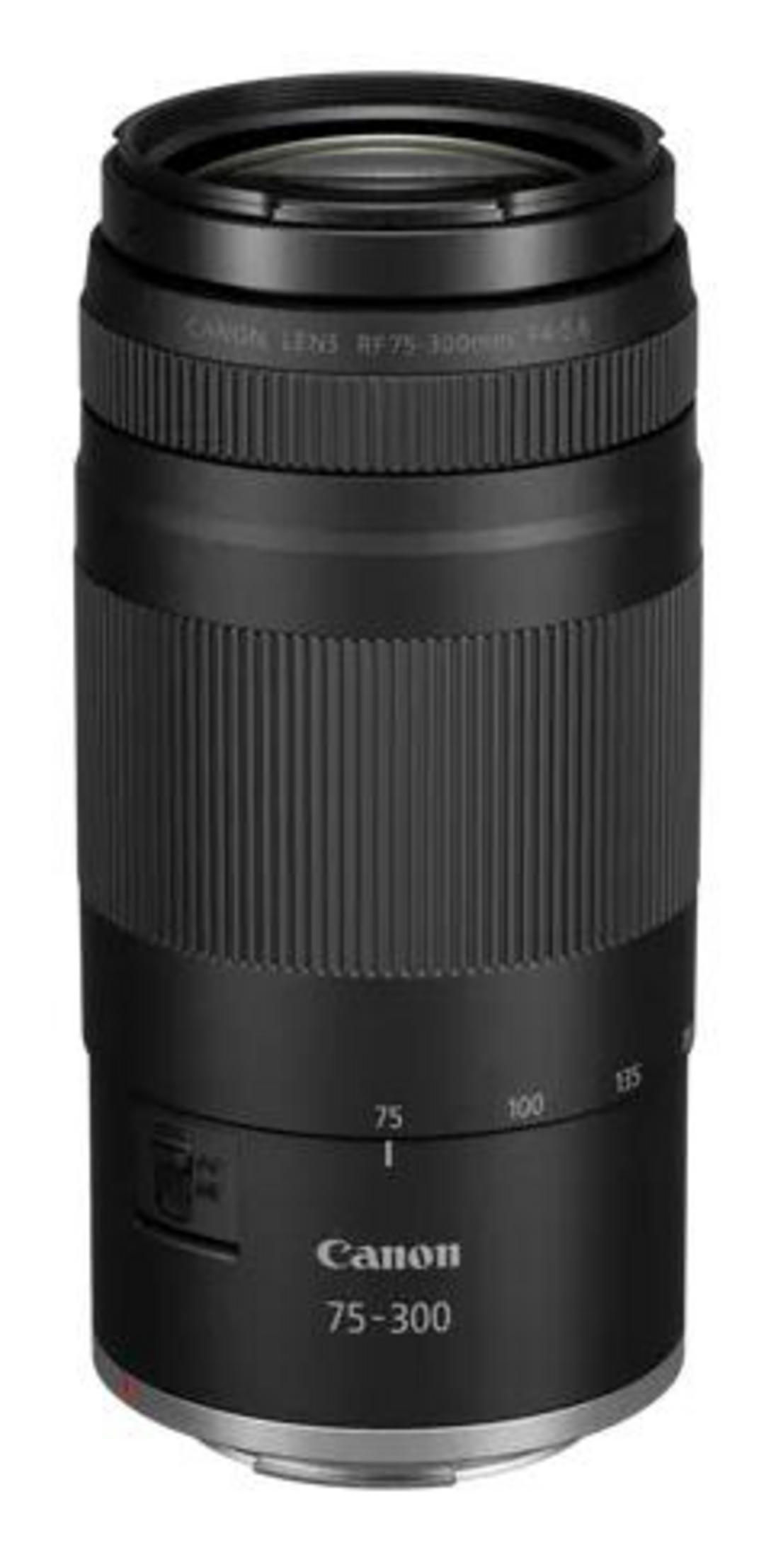 Lente Canon RF 75-300mm negra con anillos de enfoque y marcas de zoom.