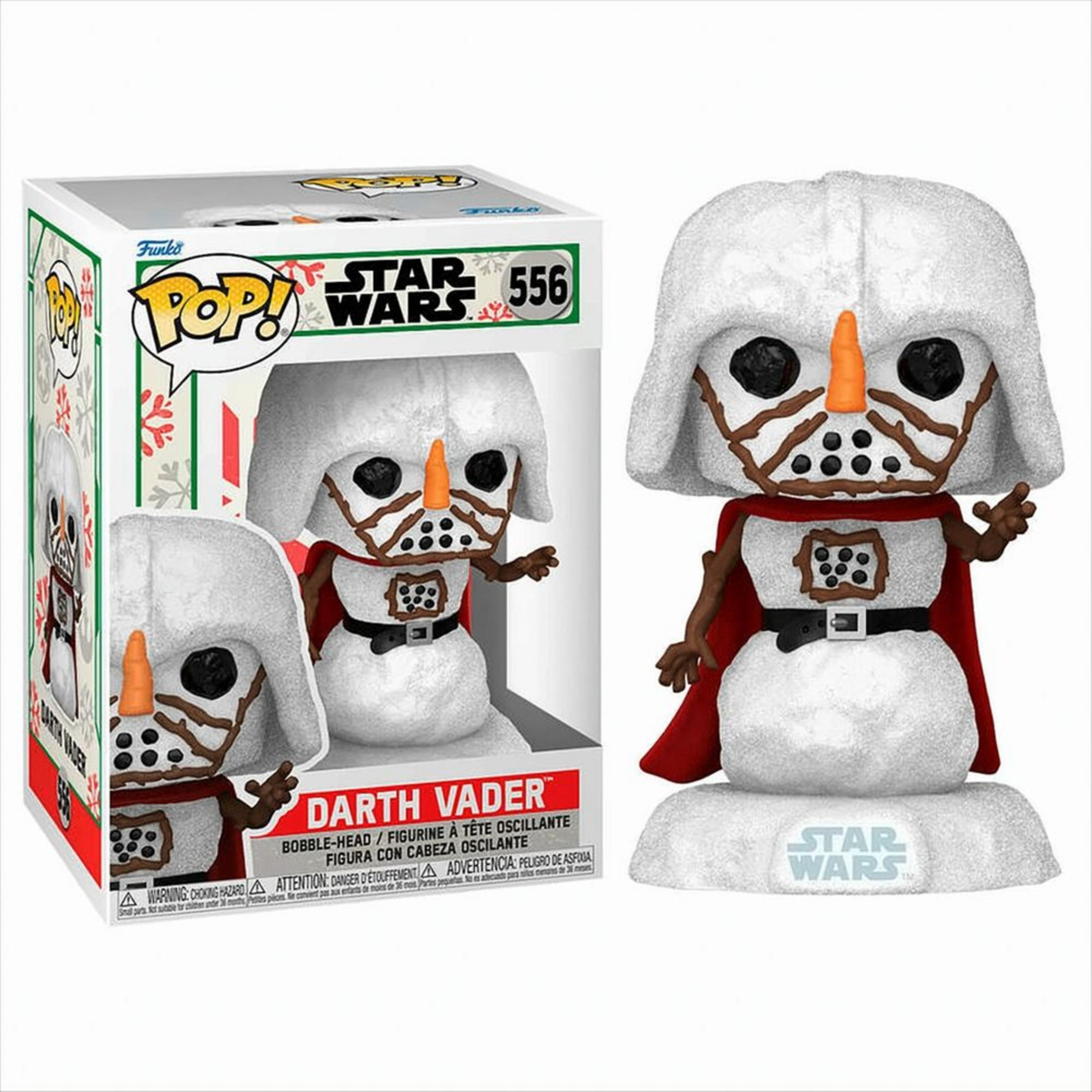 Una figura Funko Pop! di Darth Vader pupazzo di neve con mantello rosso ed emblema Star Wars.