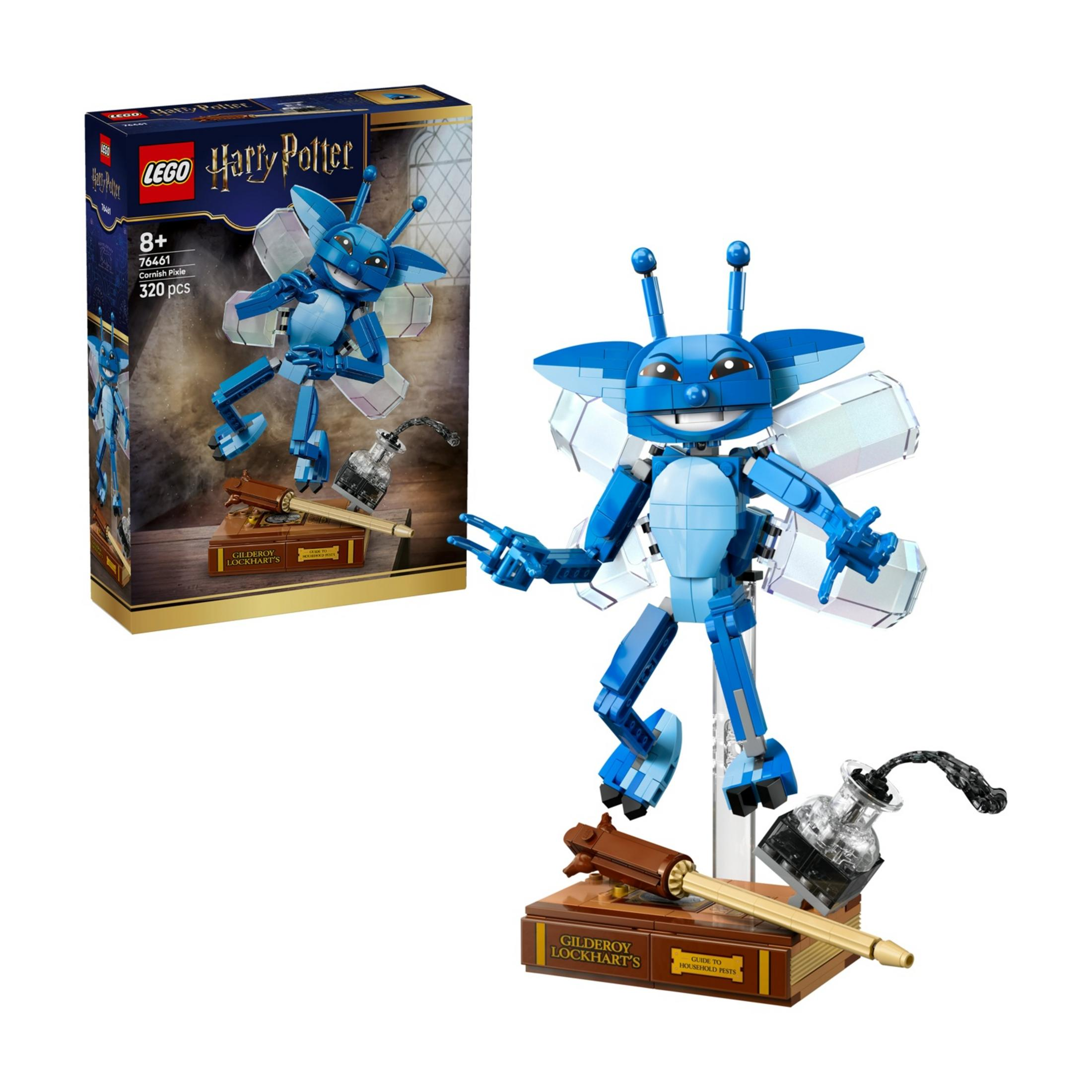 Kanatlı mavi LEGO Cornish Pixie, kitap, kalem ve mürekkep şişesi.