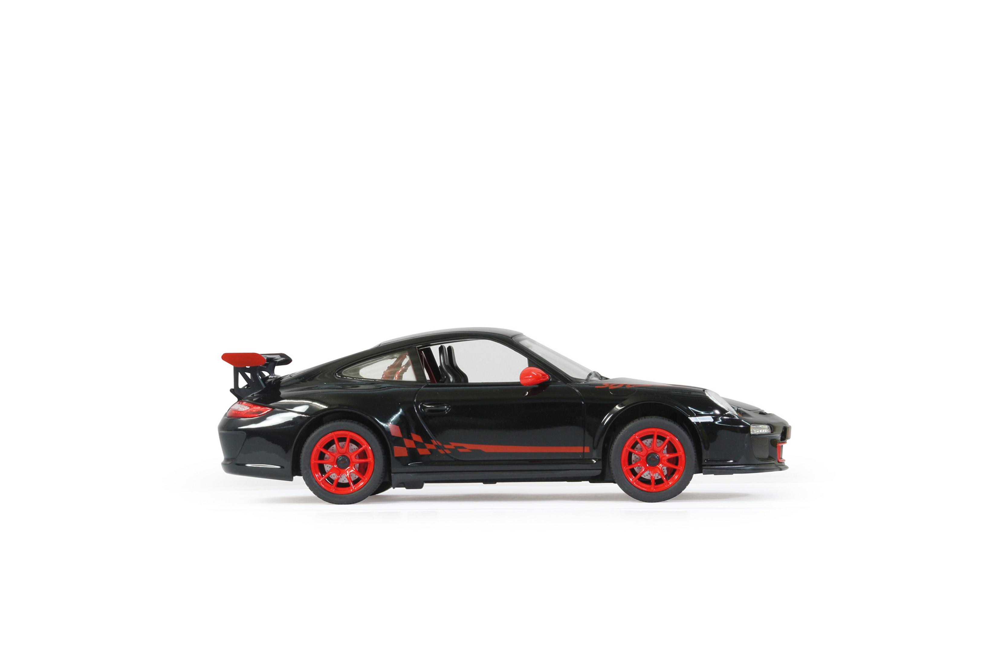 Schwarzes Spielzeugauto mit roten Akzenten, Heckspoiler und karierten Aufklebern.