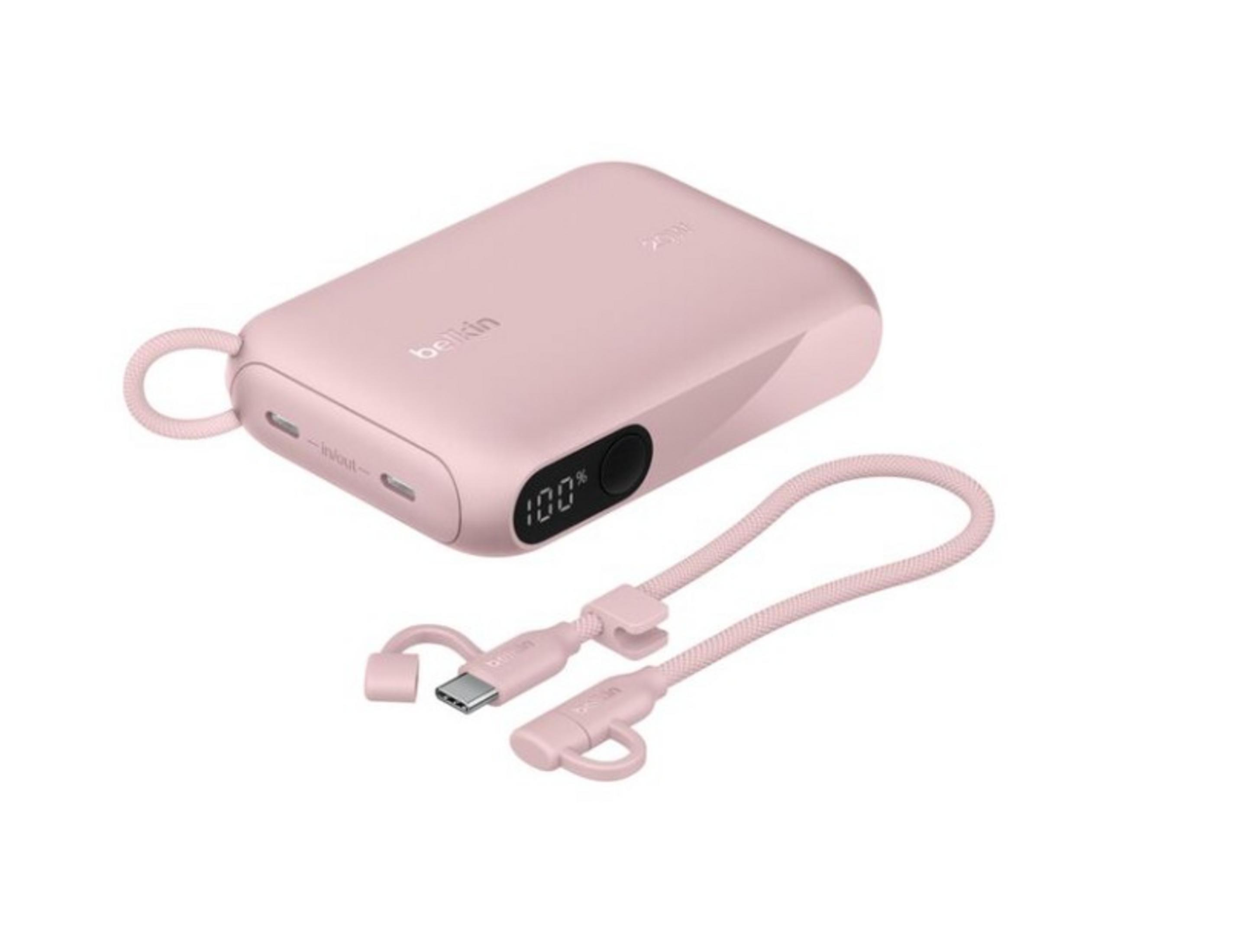 Une banque d'alimentation rose avec câble de chargement et connecteur USB-C.