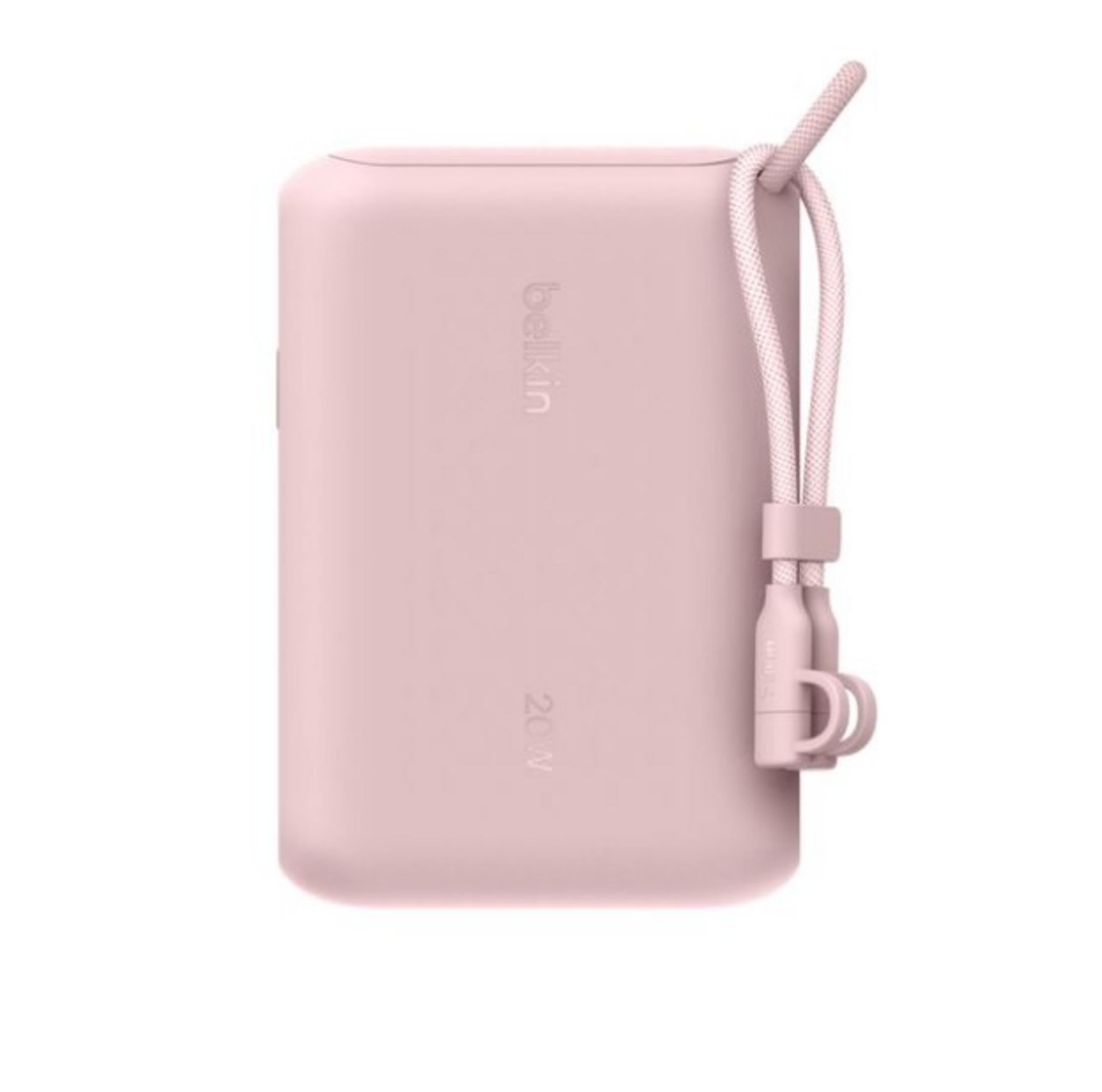 Une batterie externe rose avec une lanière et le logo Belkin, 20W.