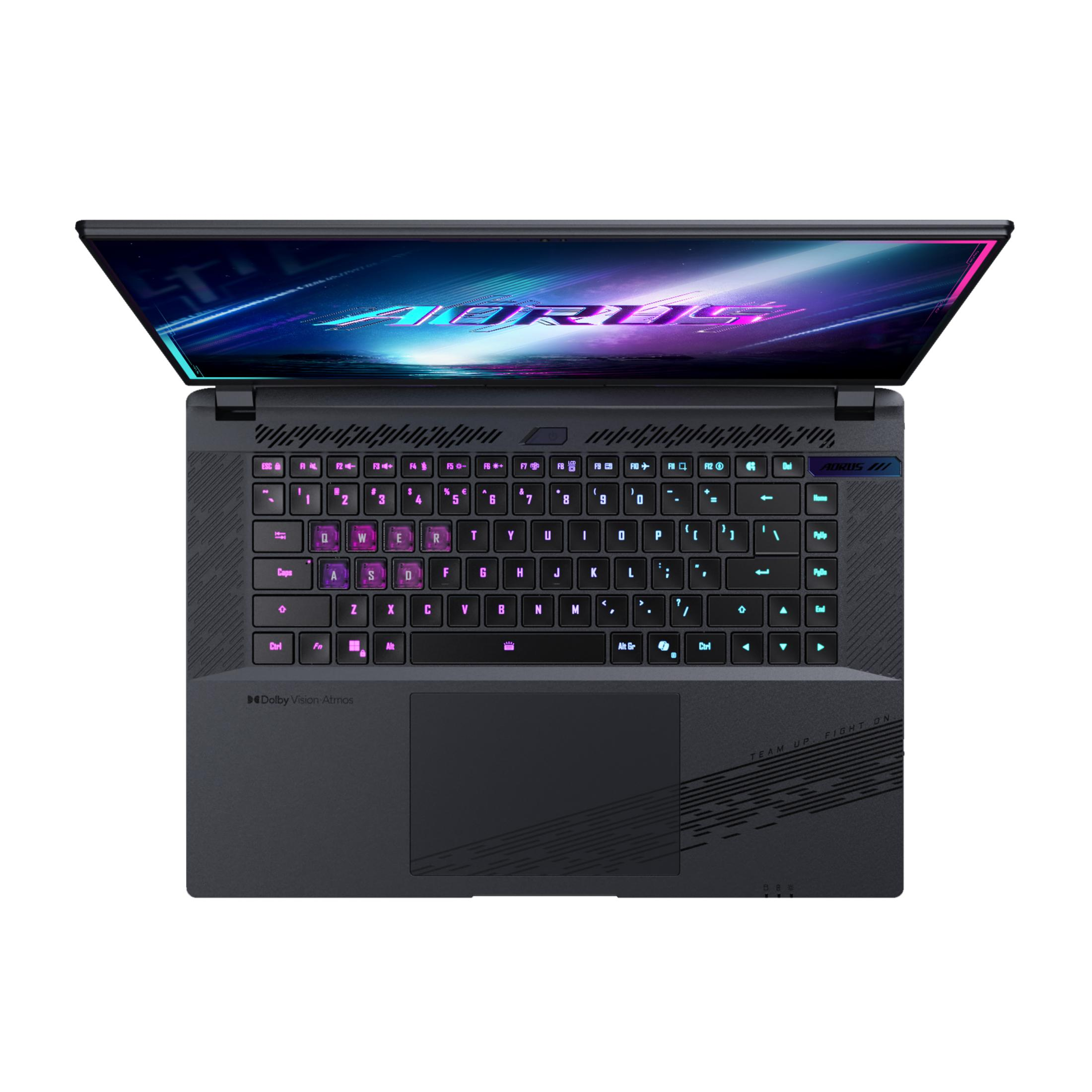Ein dunkler Laptop mit beleuchteter Tastatur und leuchtendem Bildschirm.