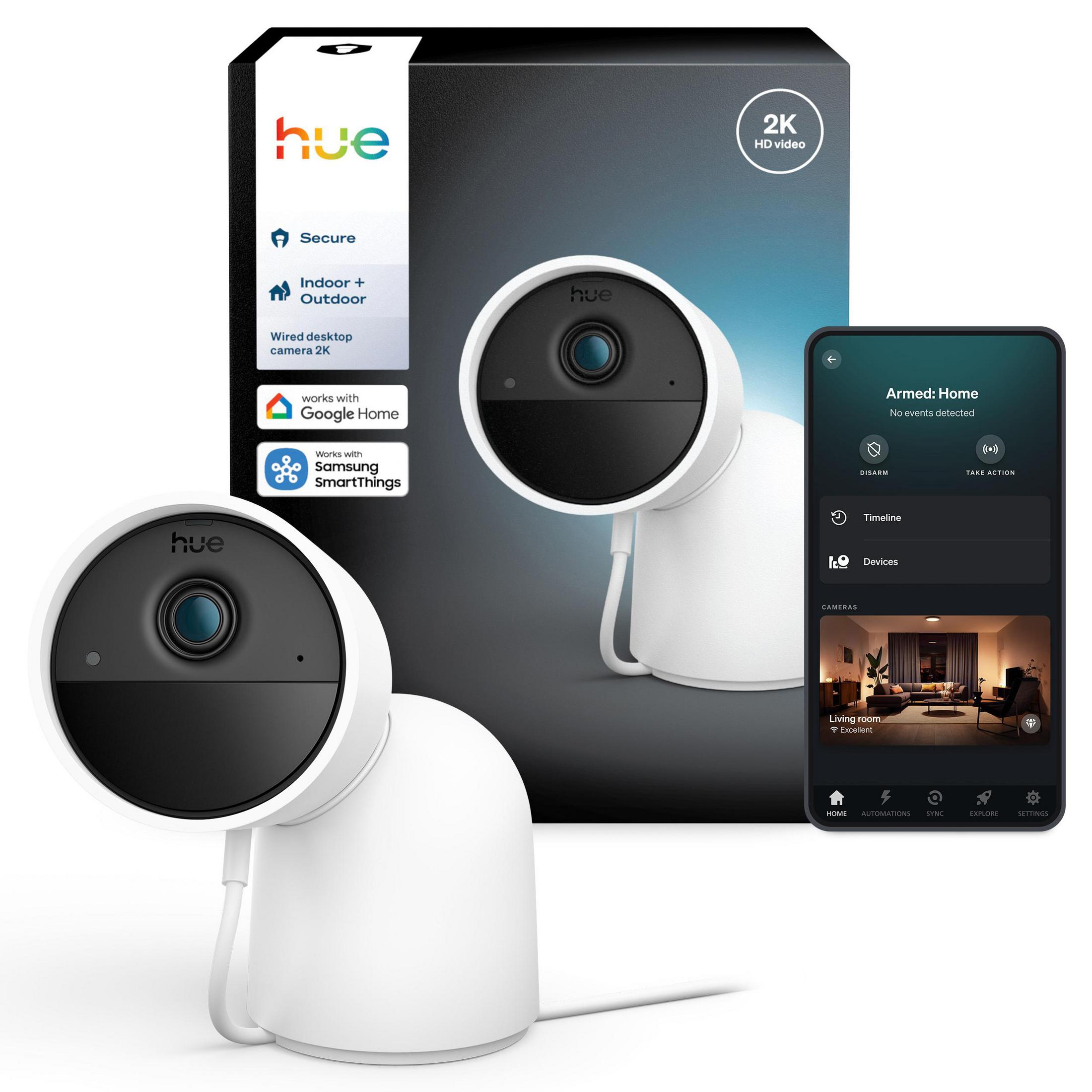 Ein weißer Hue-Überwachungsmonitor mit Verpackung und Smartphone-App.