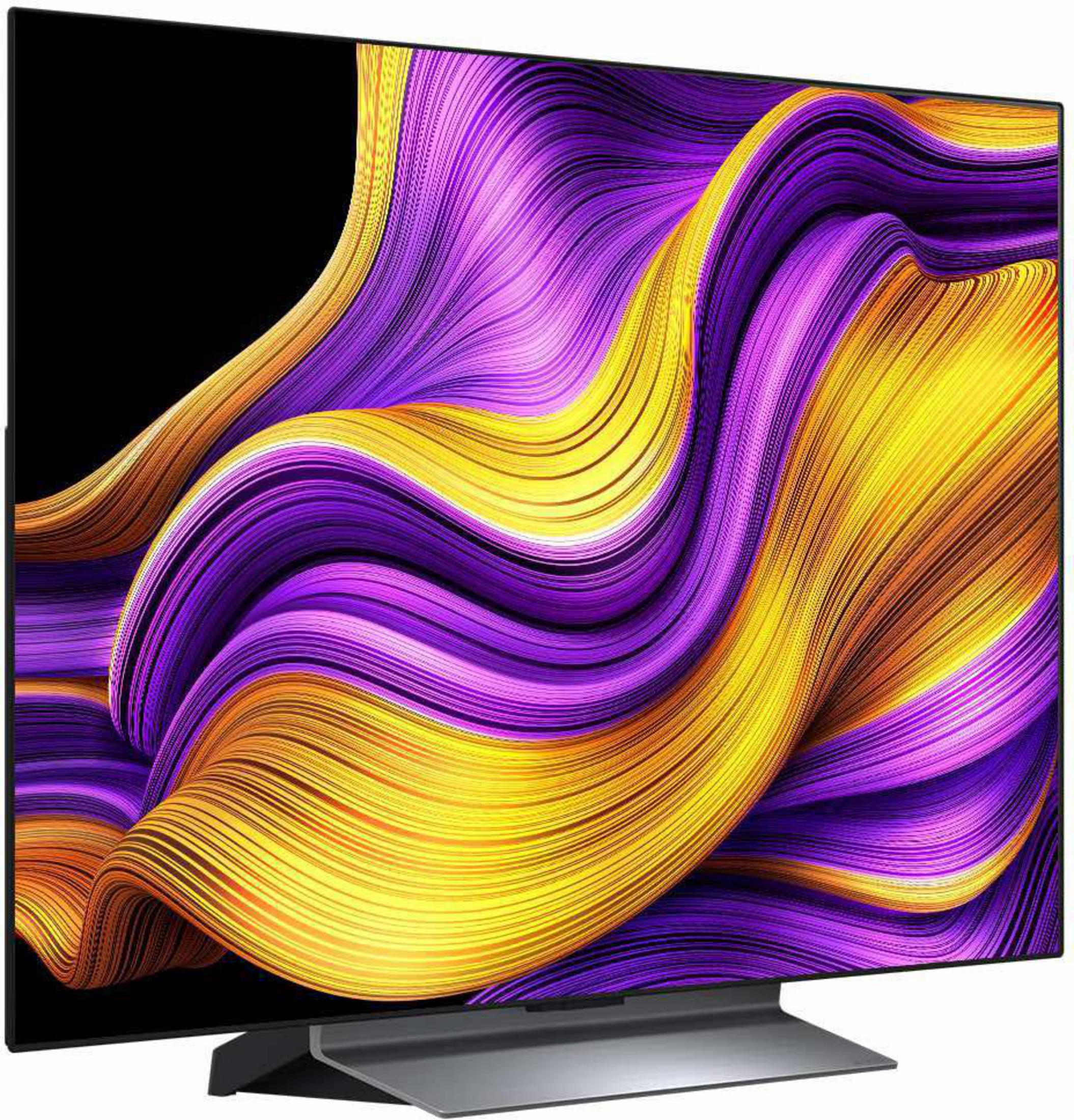 Un televisore moderno con uno schermo astratto e ondulato dai colori viola e giallo.