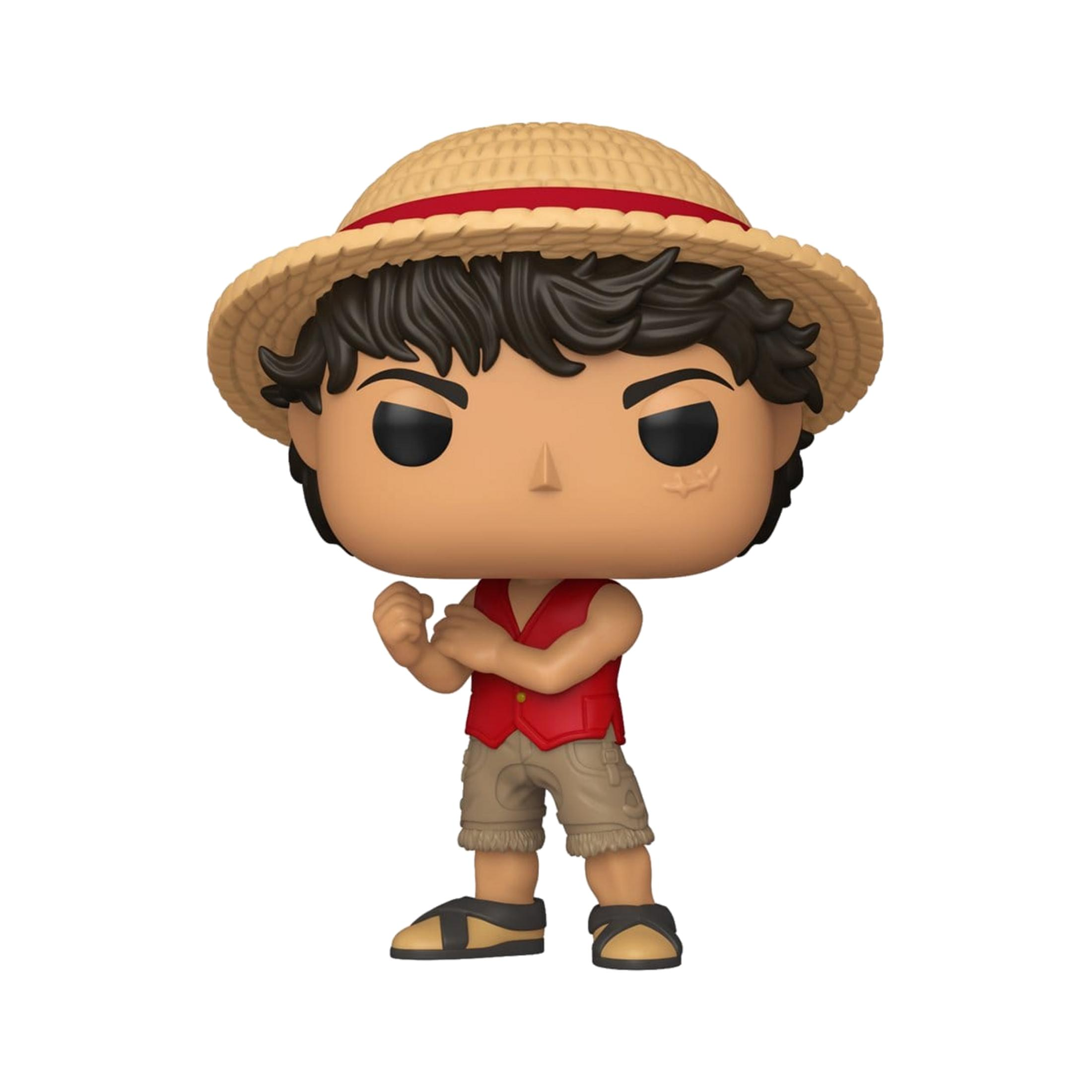 Eine Figur mit Strohhut, roter Weste und Shorts.
