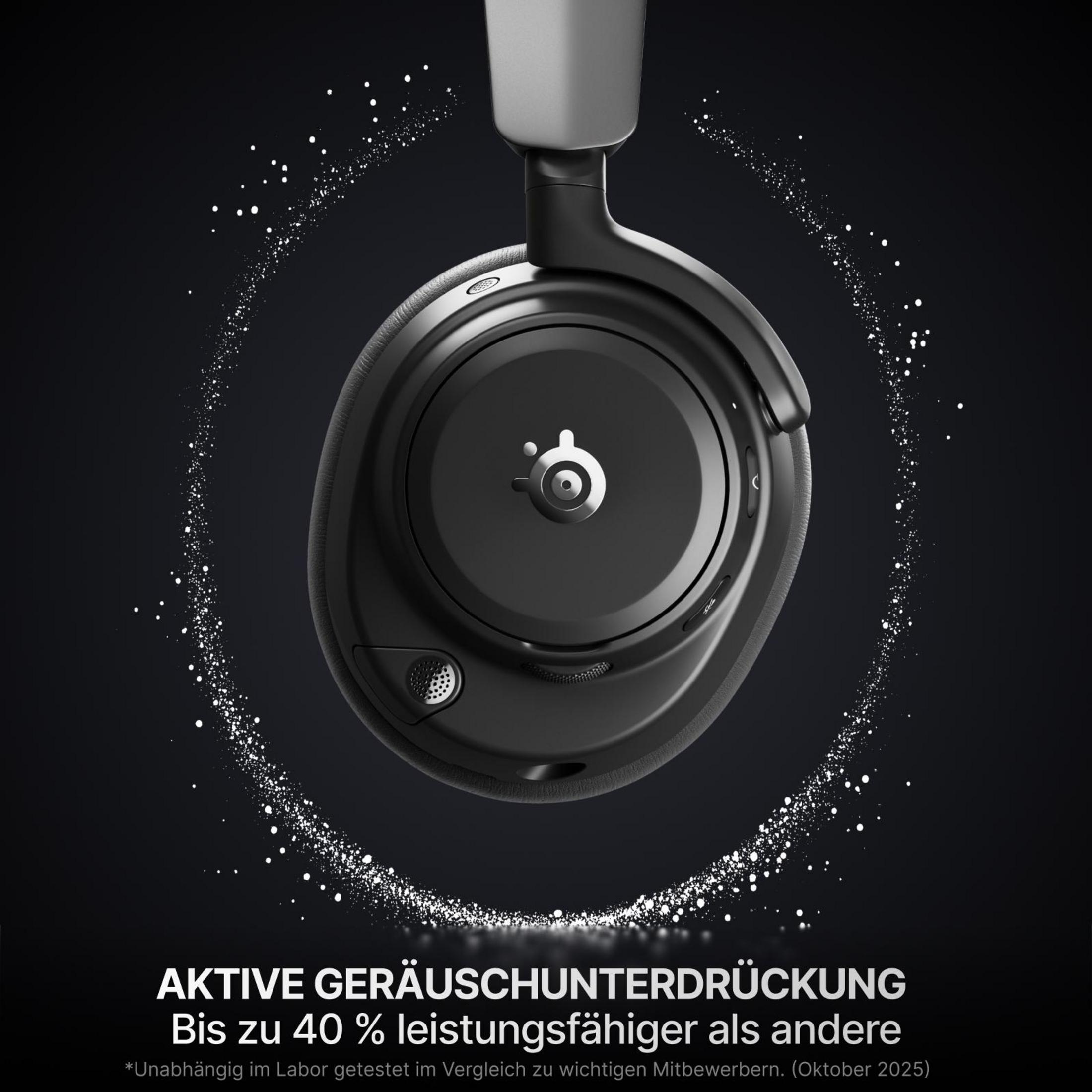 Auriculares negros con logo blanco, rodeados de partículas brillantes sobre fondo negro.