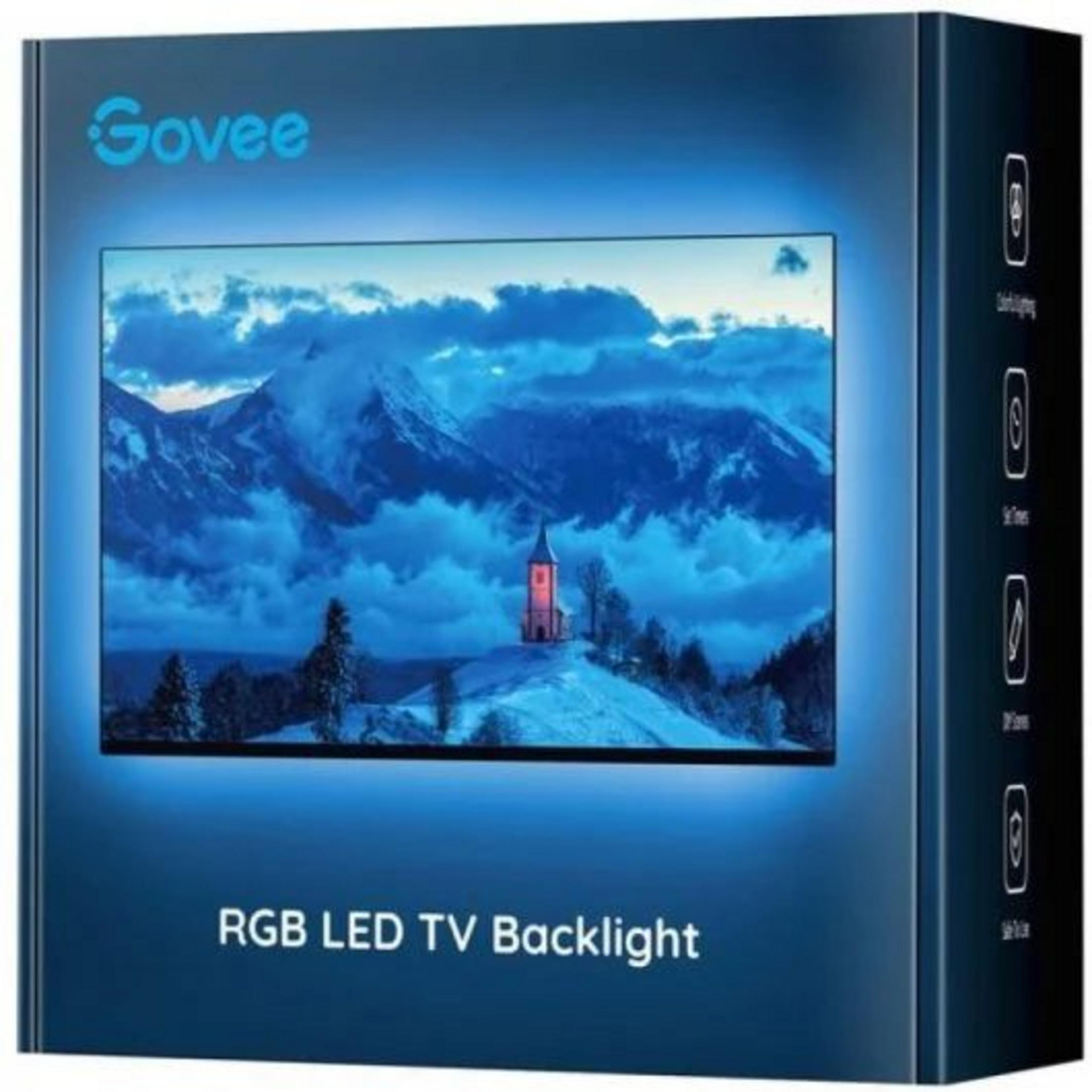 Scatola retroilluminazione LED RGB Govee per TV con scena invernale di montagna e chiesa.