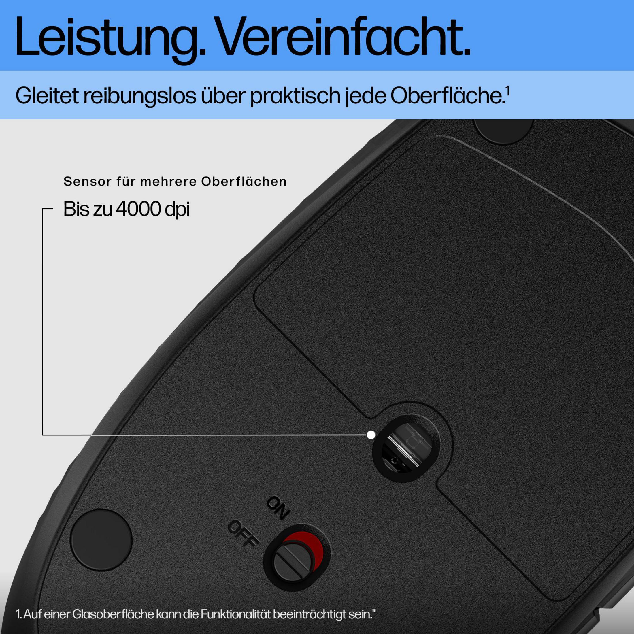 Primo piano del lato inferiore di un mouse nero con interruttore on/off.