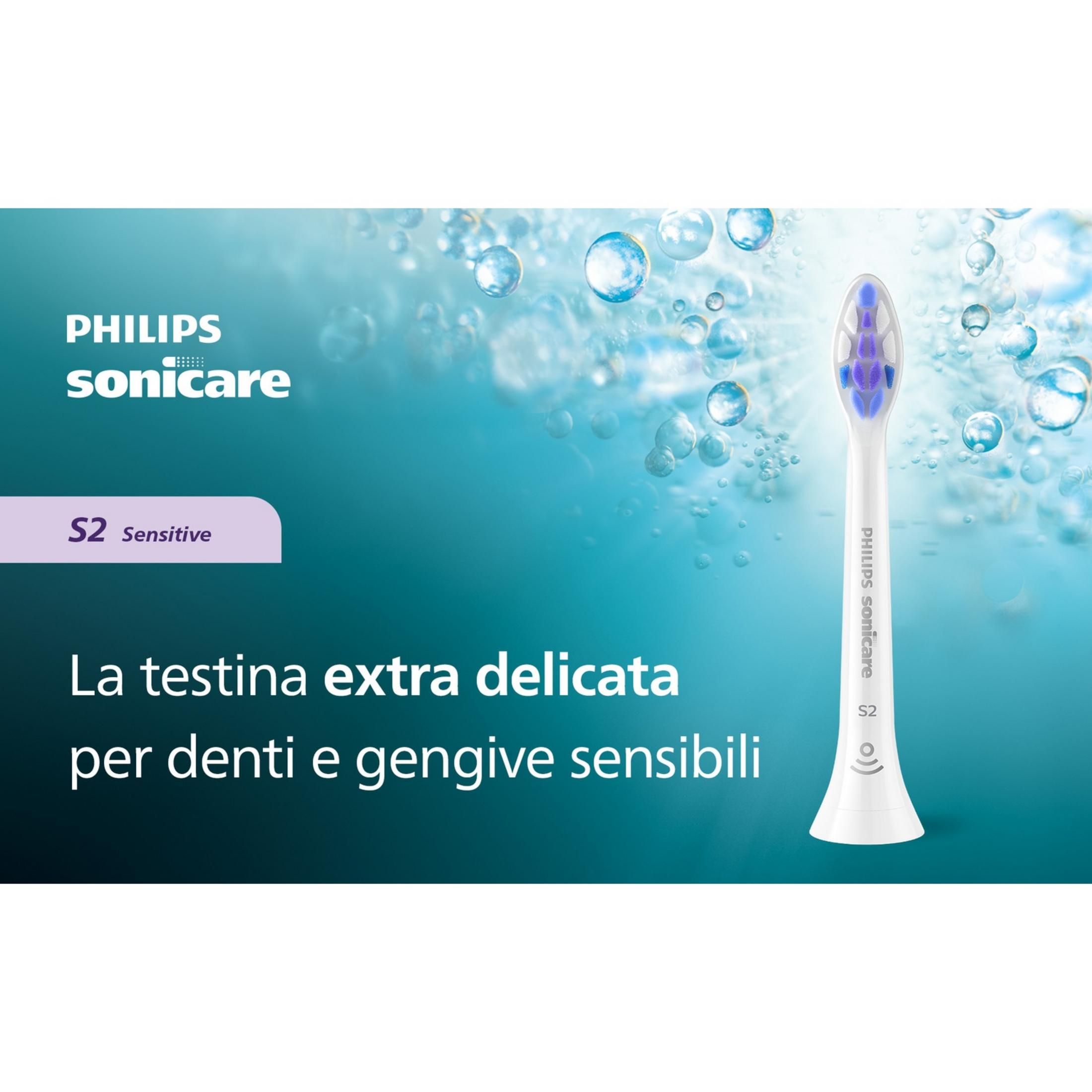 Philips Sonicare S2 Sensitive Zahnbürstenkopf auf blauem Hintergrund mit Blasen.