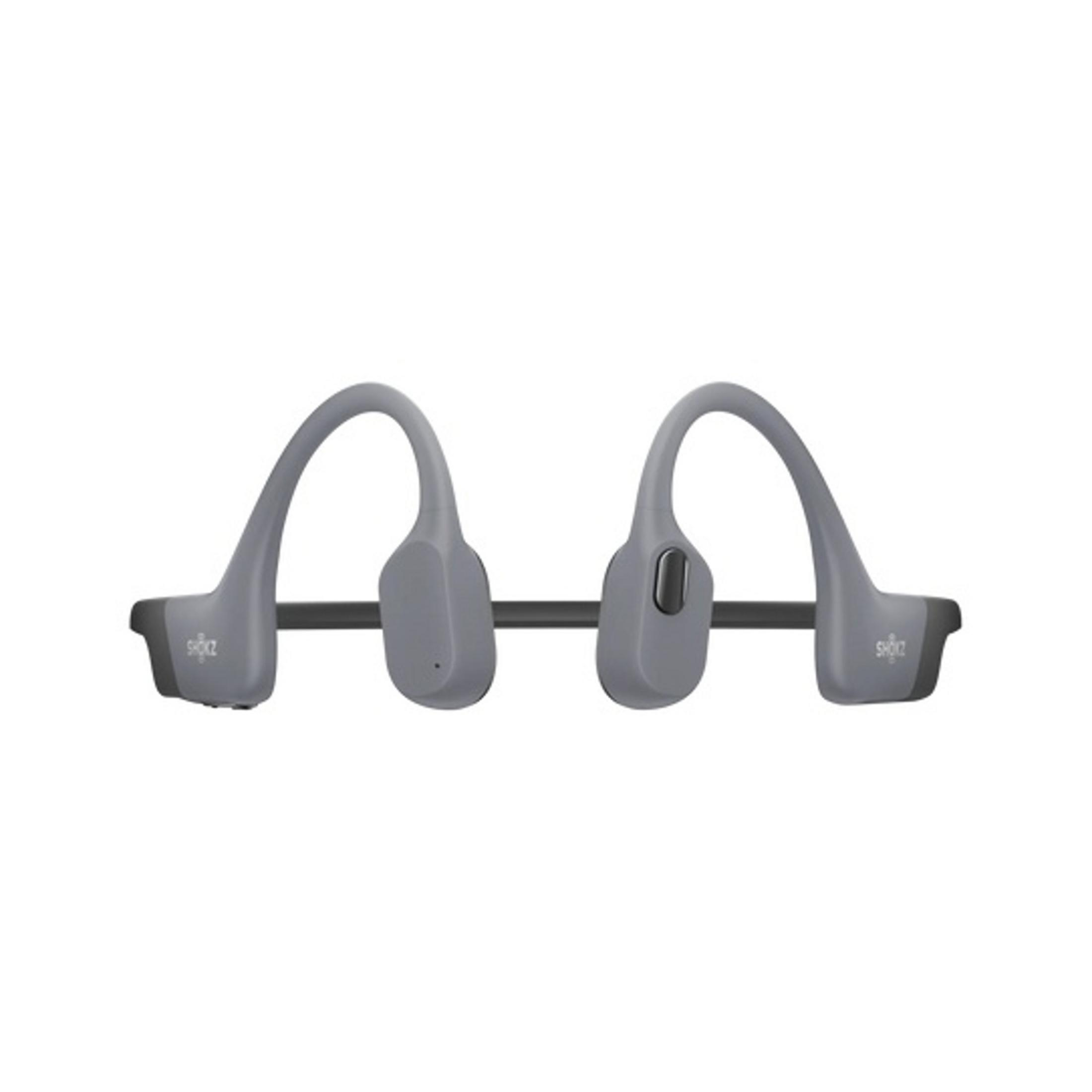 Cuffie a conduzione ossea grigie con fascia nera e pulsante argentato.