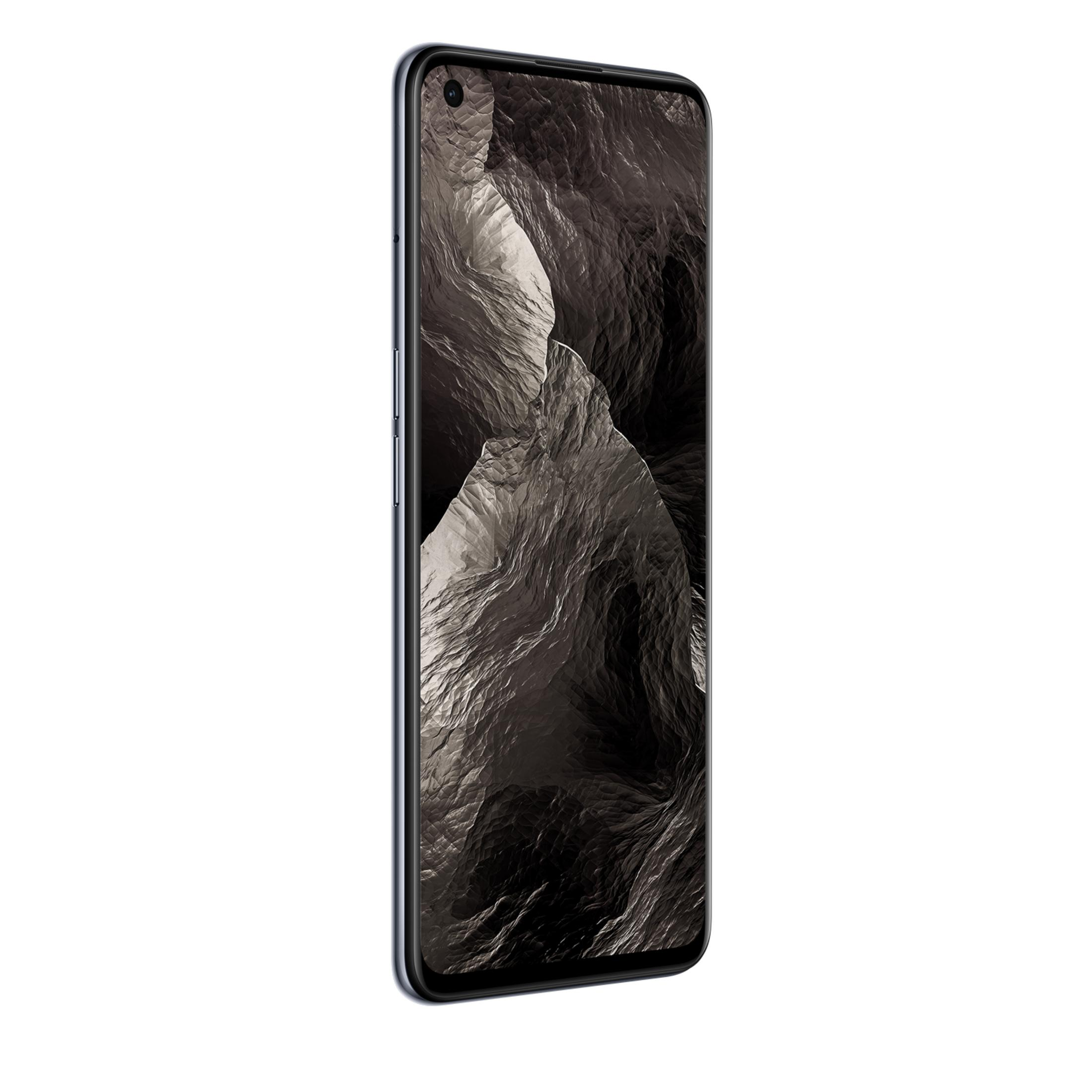 Ein dunkles Smartphone mit einem Bergmotiv auf dem Bildschirm.