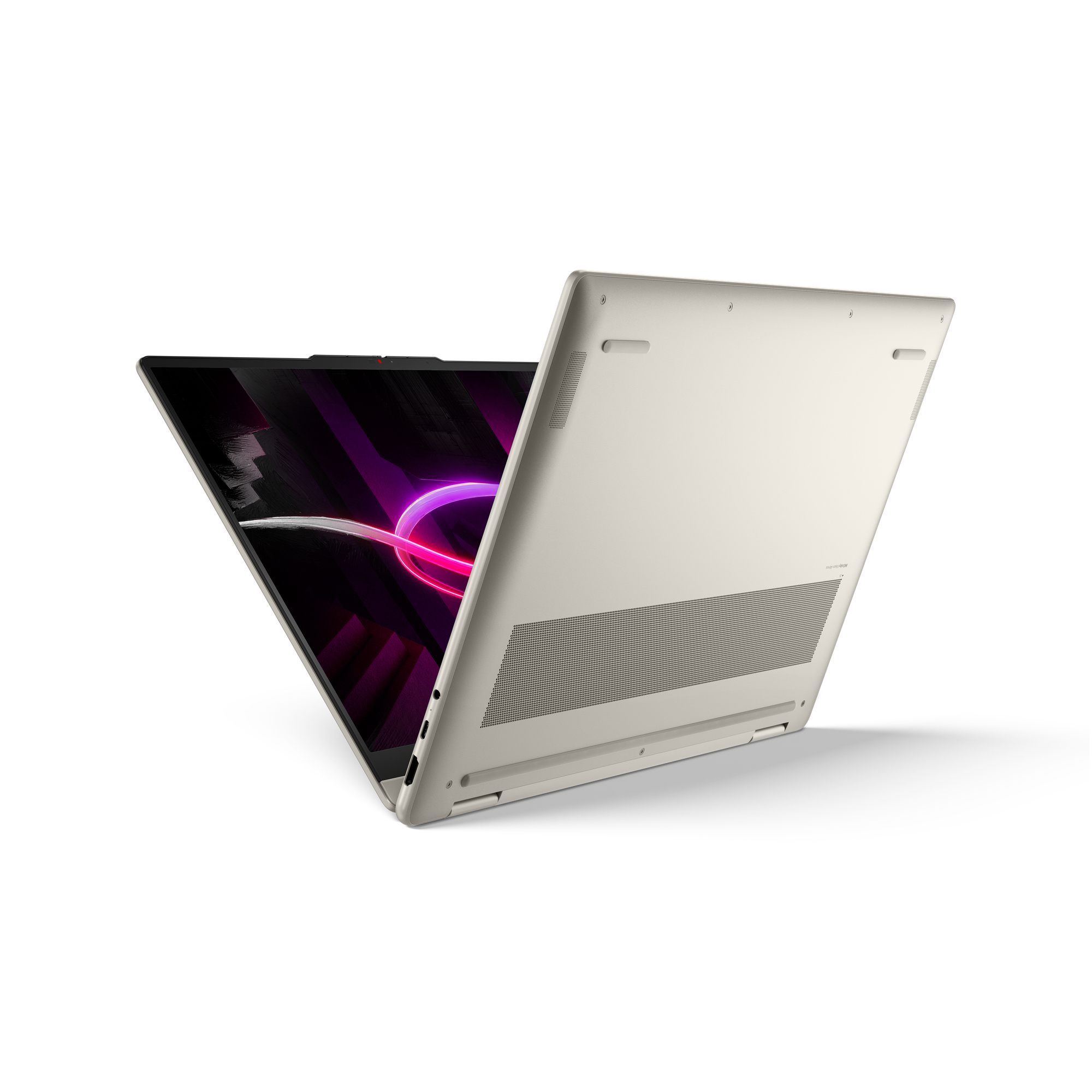 Ein geöffneter Laptop in hellem Beige mit einem lila-schwarzen Hintergrundbild auf dem Bildschirm.