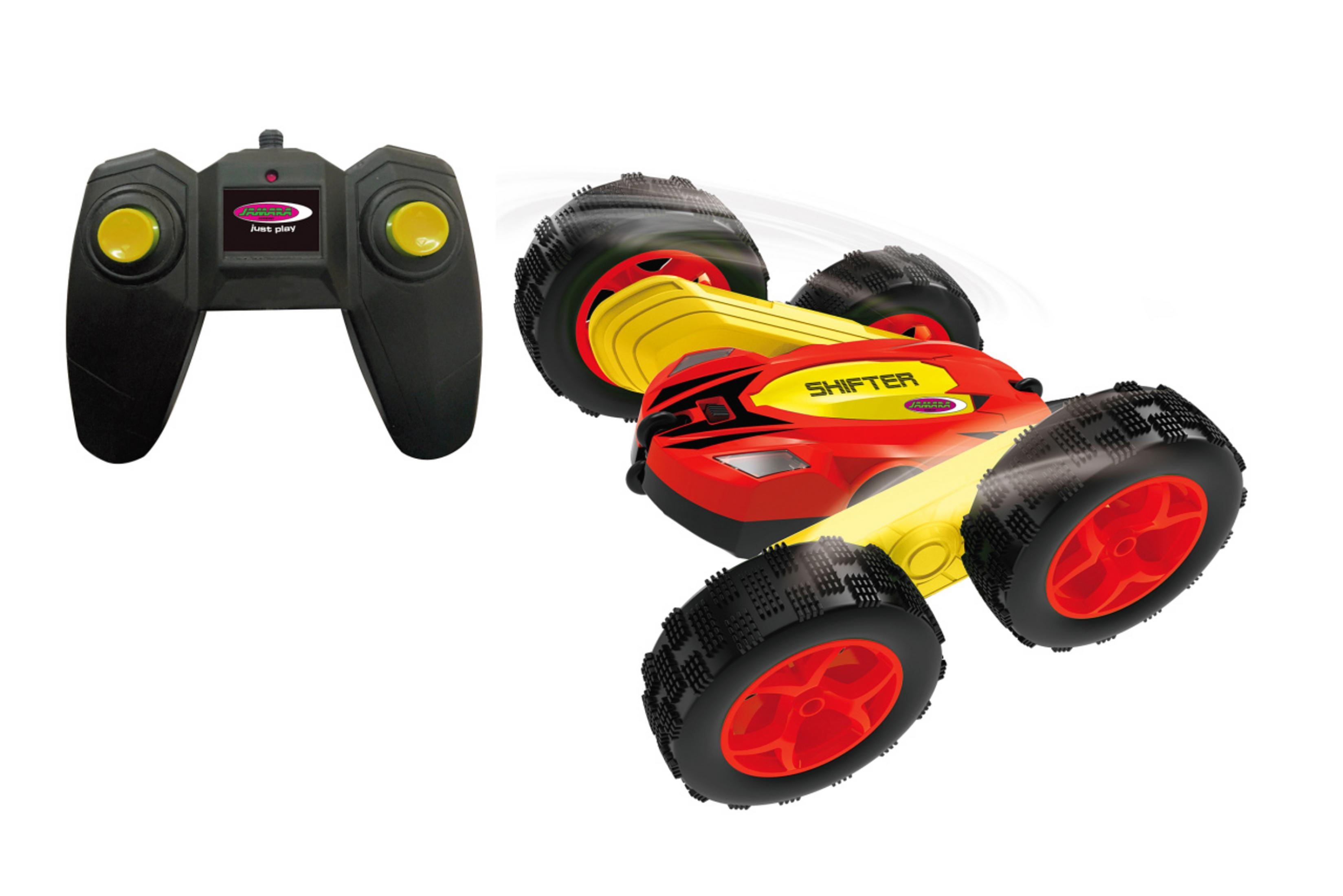 Ein rotes und gelbes ferngesteuertes Auto mit großen Reifen neben einer schwarzen Fernbedienung.