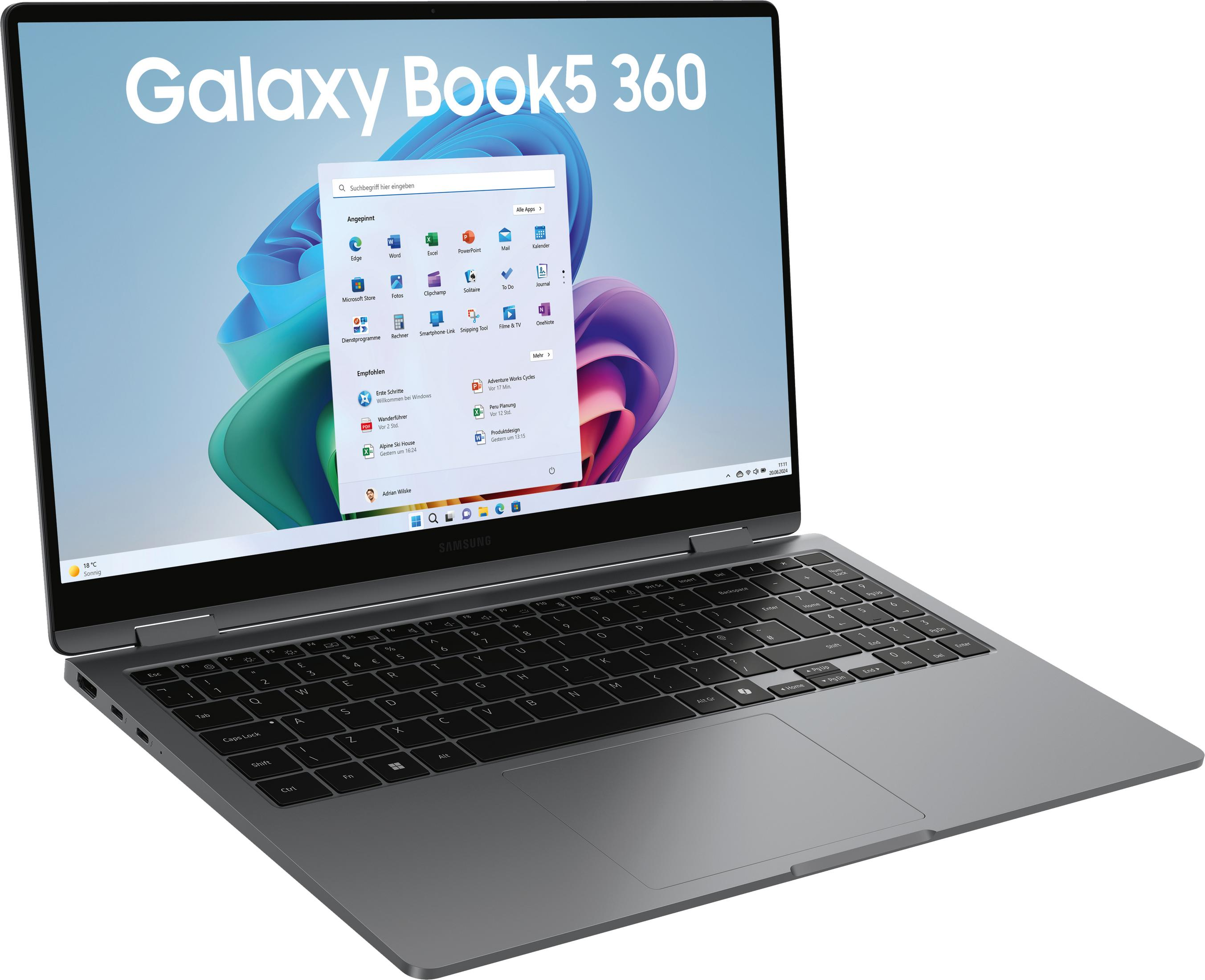 Szary laptop Samsung Galaxy Book 5 360 wyświetlający menu Start systemu Windows z kolorową grafiką tła.
