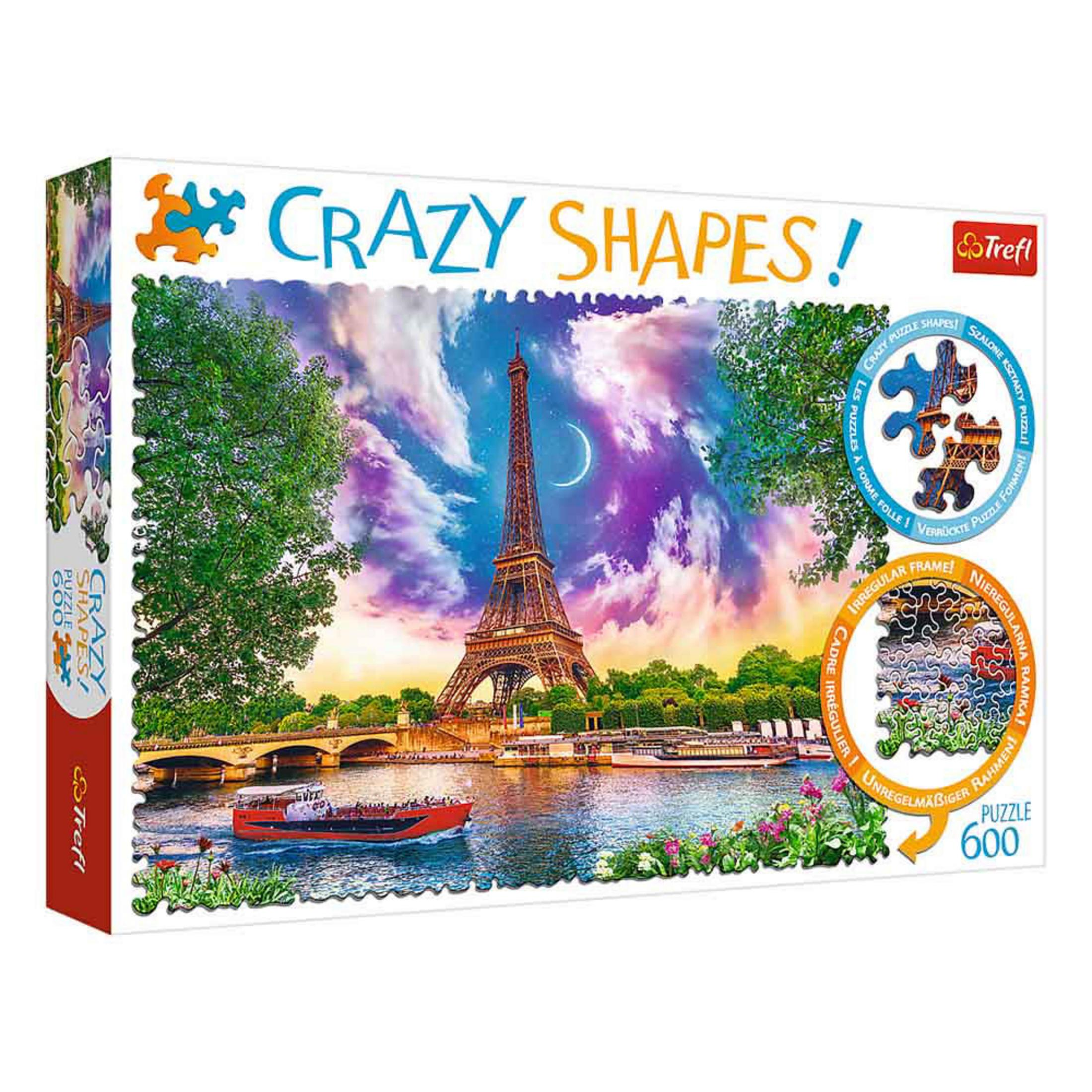 Scatola puzzle con Torre Eiffel, barca sulla Senna, cielo colorato, alberi verdi.