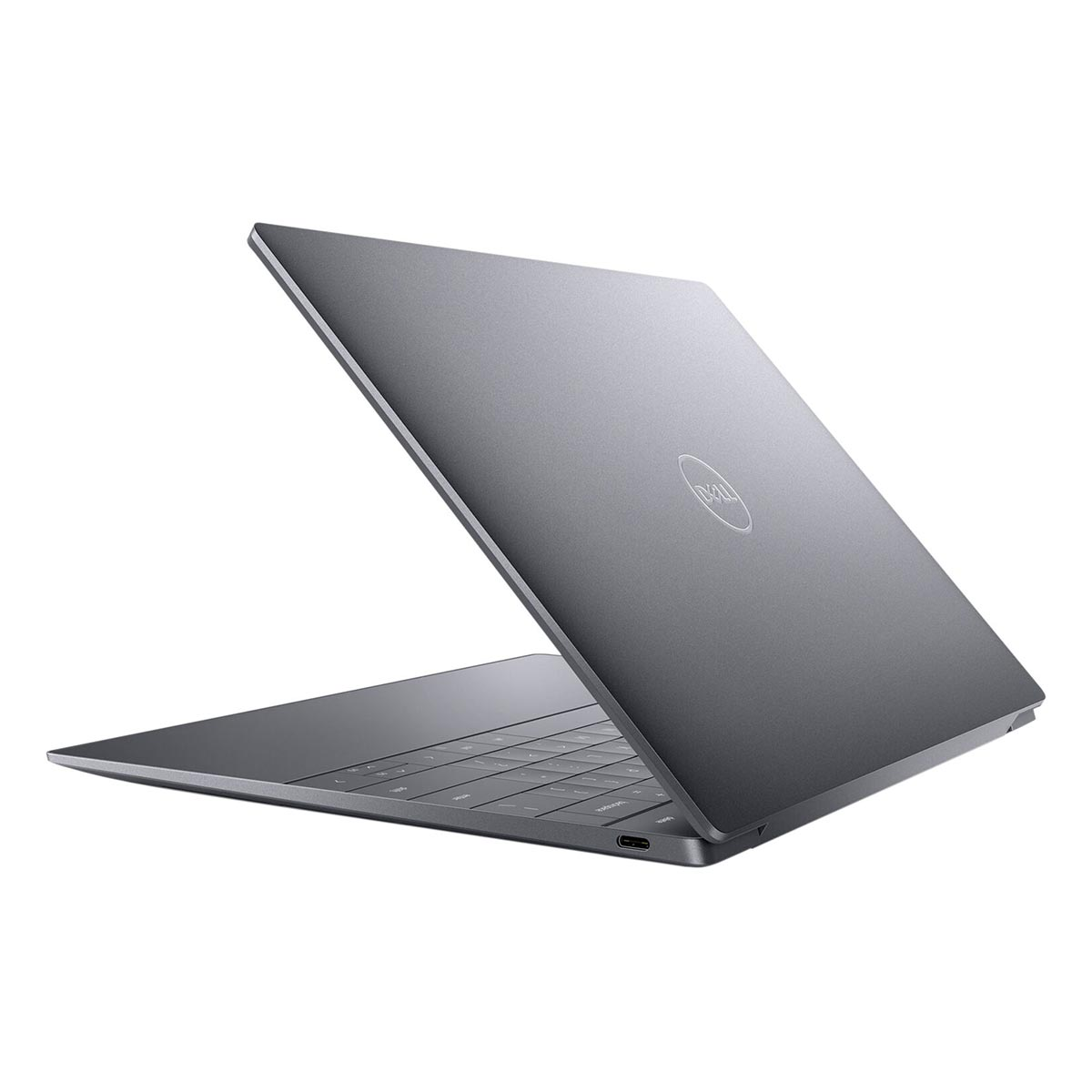 Szary laptop Dell z otwartą pokrywą, widoczna klawiatura i port USB-C.