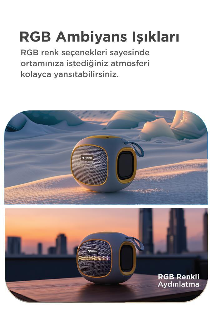 Karlı bir arazide ve gün batımında şehir silüeti önünde taşınabilir hoparlör.