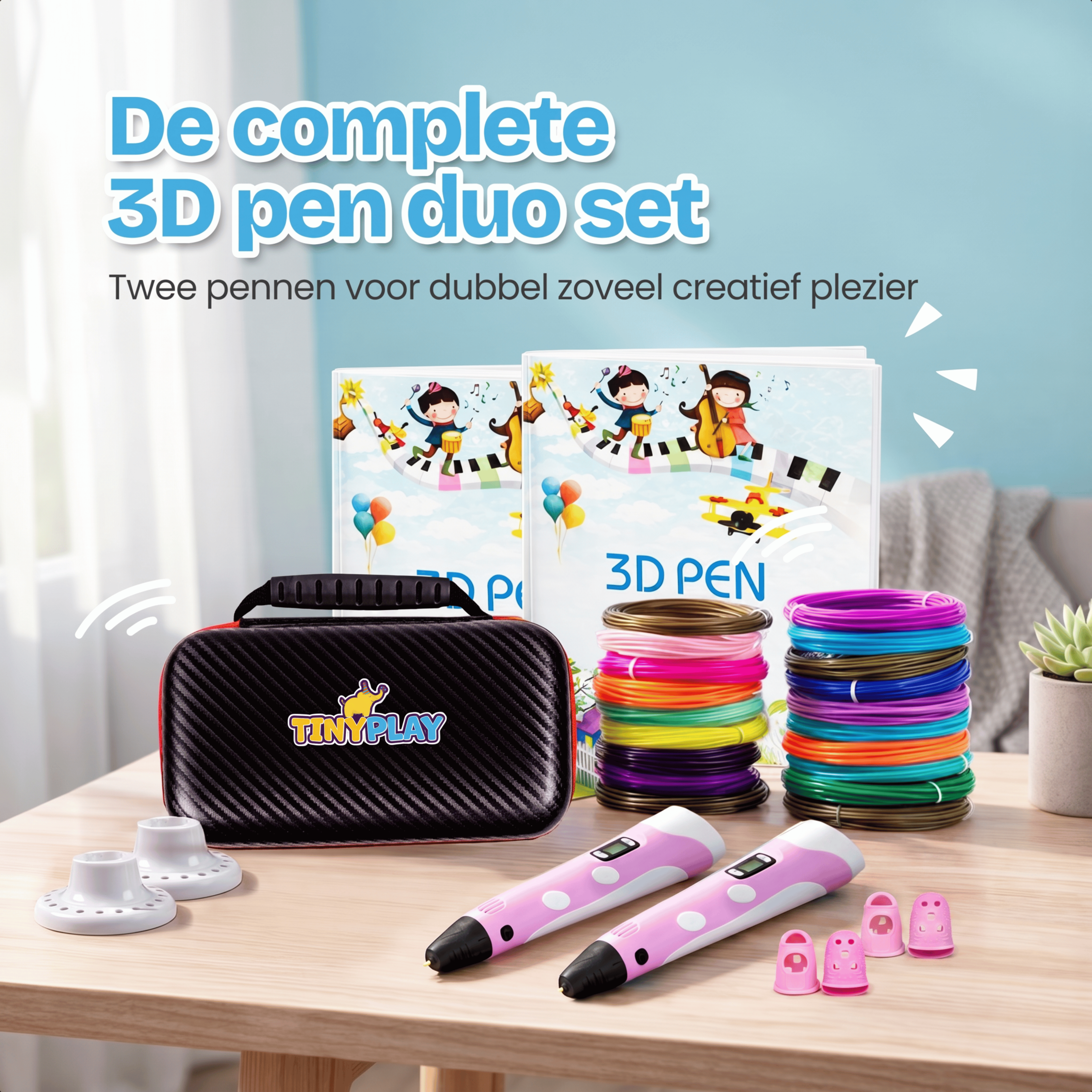 Twee roze 3D-pennen, zwarte koffer, kleurrijke filamentrollen, witte houders.