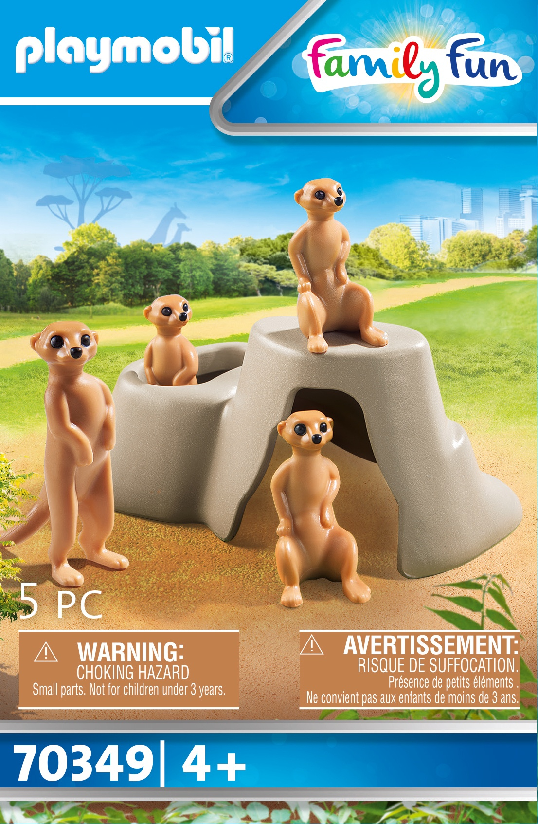 Quatre suricates Playmobil devant un rocher et des arbres.