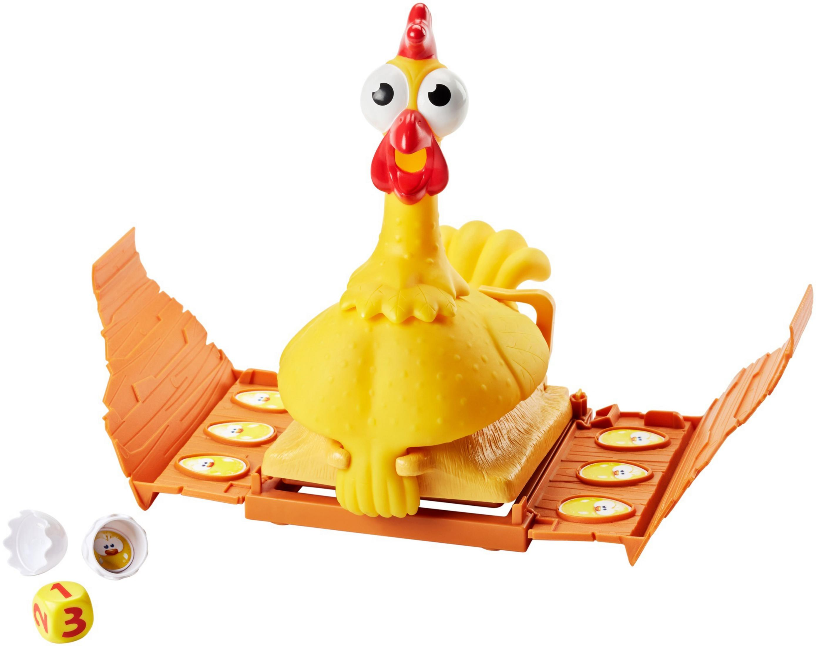 Ein gelbes Gummihuhn sitzt auf einem braunen Brett mit orangefarbenen Flügeln.