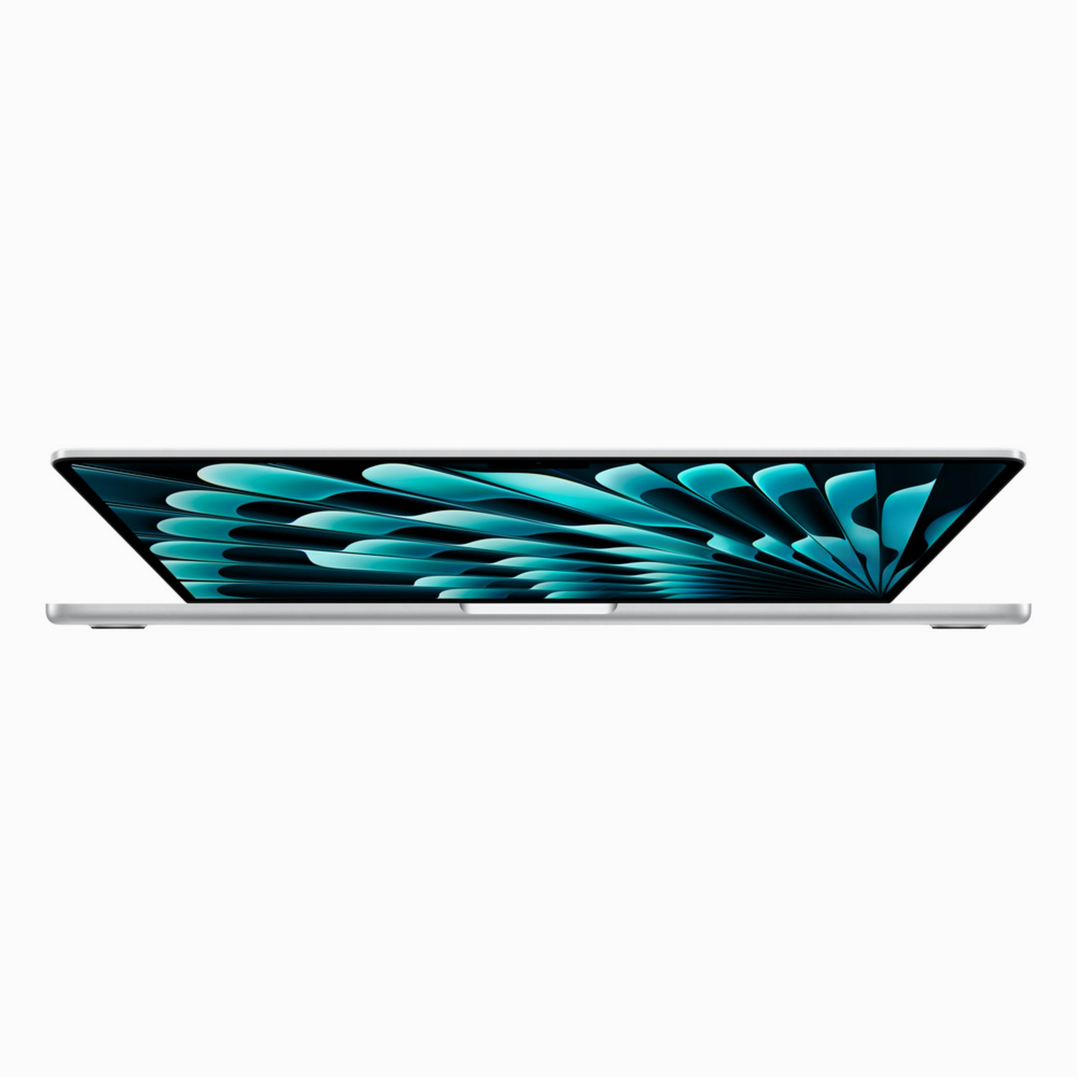 Un laptop argentato è aperto, con uno sfondo astratto blu e turchese.
