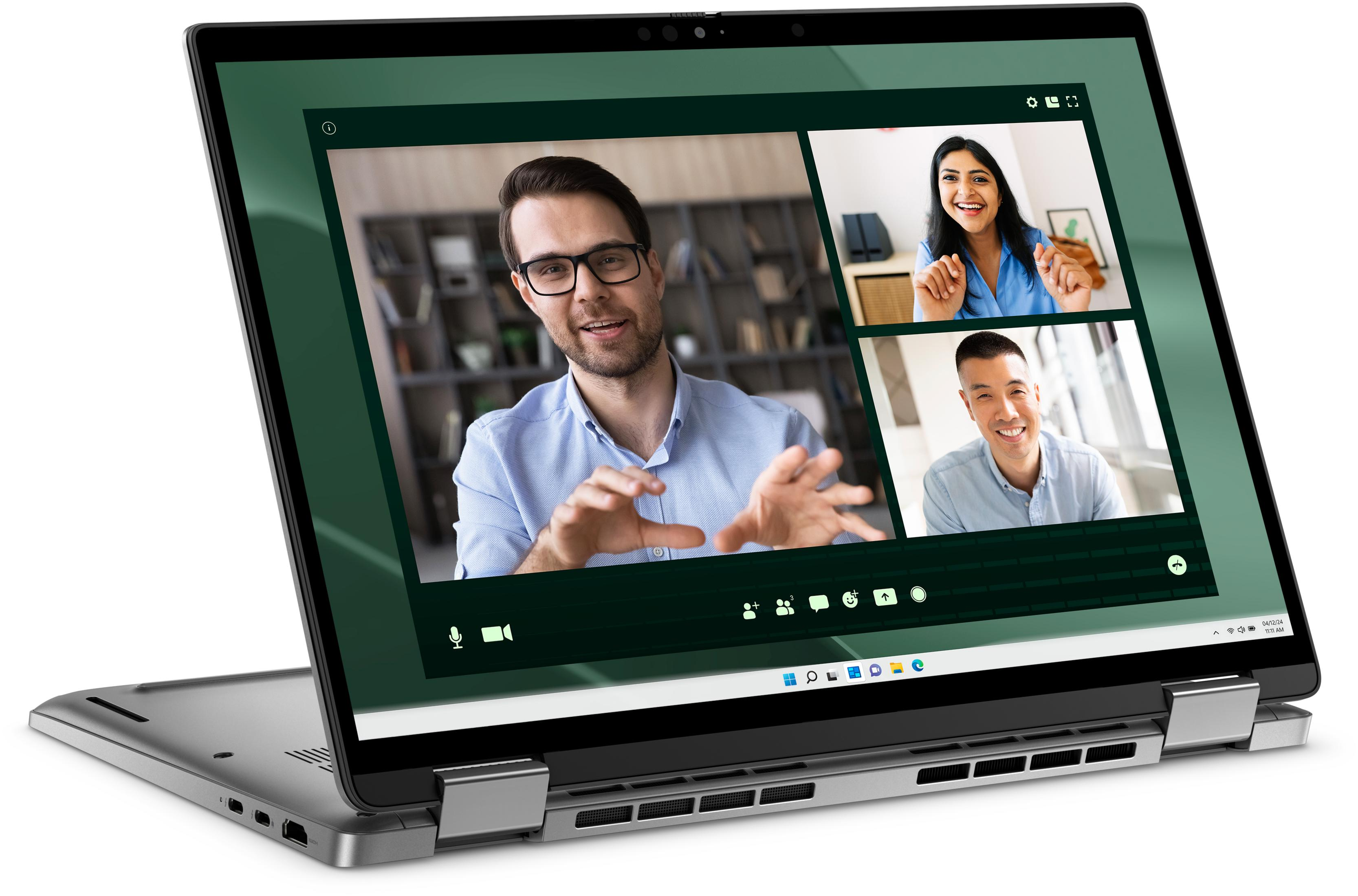 Ein Laptop zeigt einen Videocall mit drei Personen in geteilten Bildschirmen.