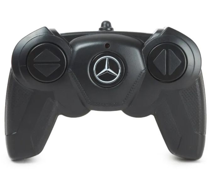 Czarny pilot Mercedes z dwoma joystickami i logo Mercedes.