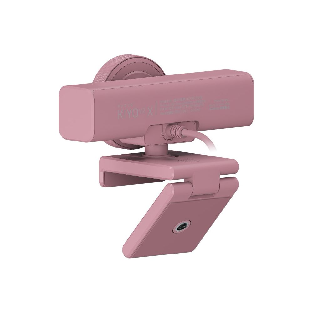 Viene mostrata una webcam Razer Kiyo X rosa con supporto a clip e cavo USB.