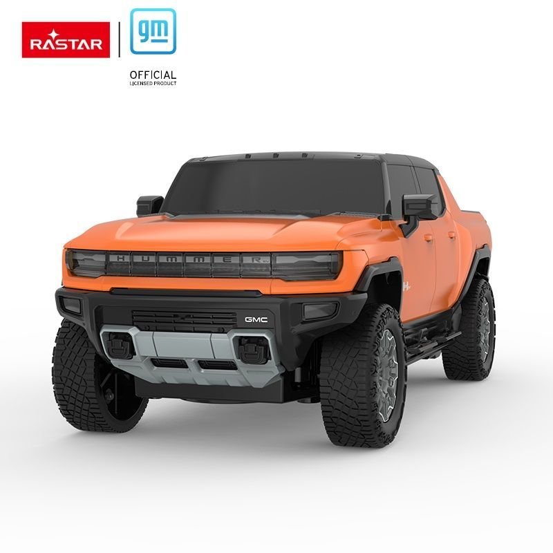 Pomarańczowa zabawka Hummer EV z logo Rastar i GM. Duża i solidna.