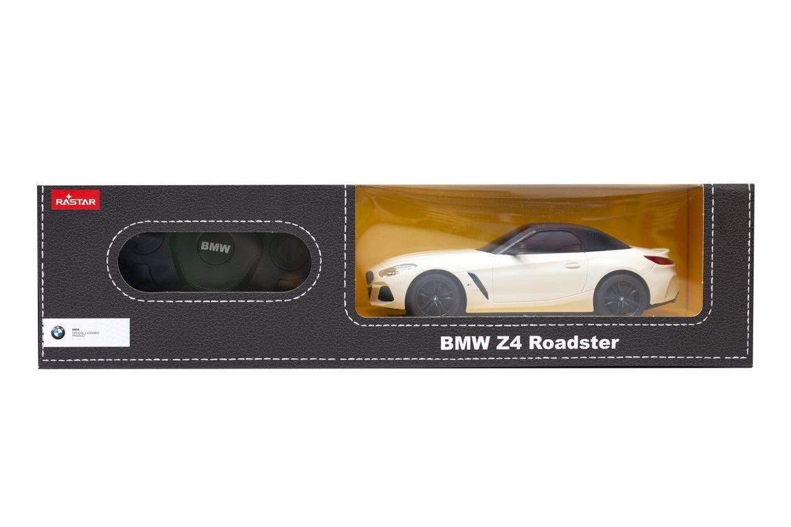Opakowanie z białym samochodem zabawką BMW Z4 Roadster i pilotem.