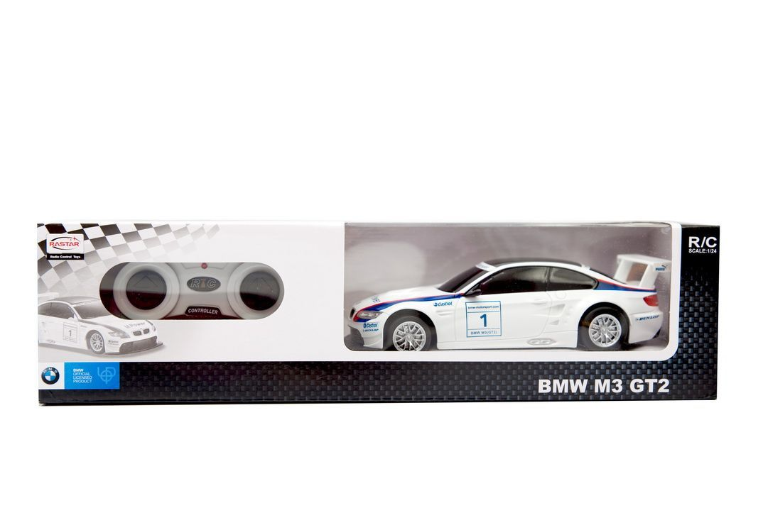 Pudełko białego samochodu RC BMW M3 GT2 z kontrolerem i naklejkami wyścigowymi.