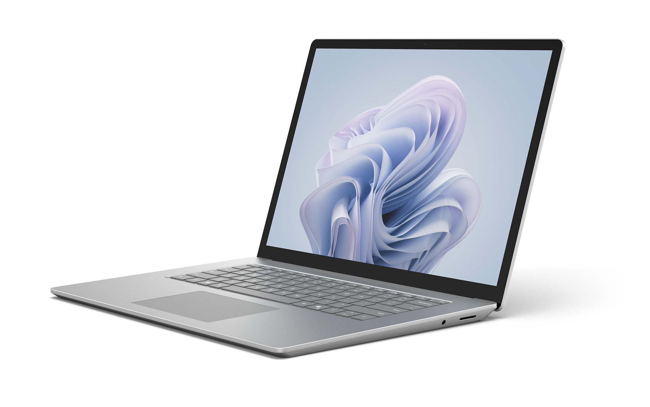 Un laptop argentato con lo schermo aperto, che mostra un motivo astratto.