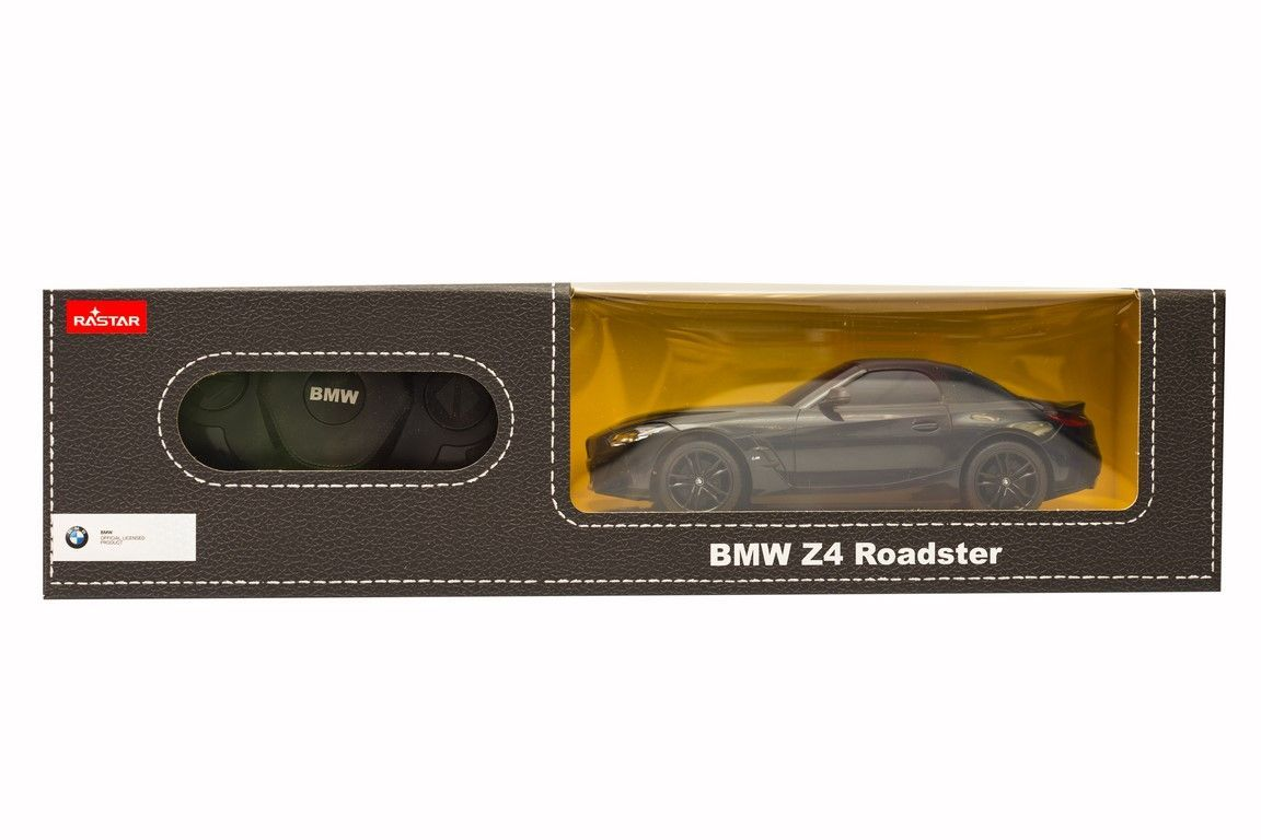 Pudełko z czarnym samochodem zabawką BMW Z4 Roadster i pilotem.