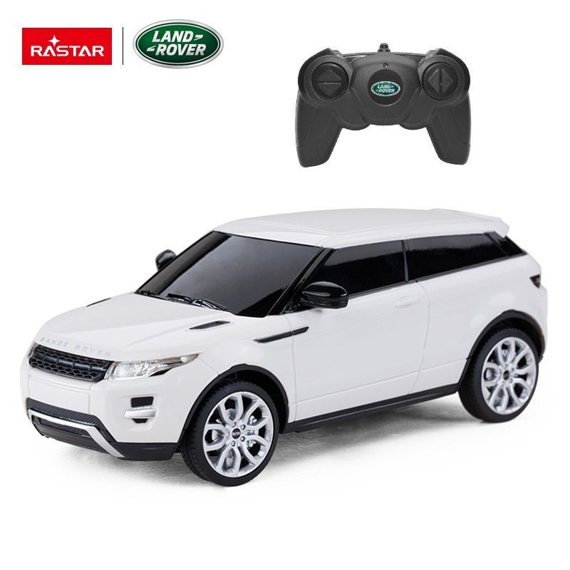 Biały model Range Rovera na pilota z kontrolerem i logotypami.