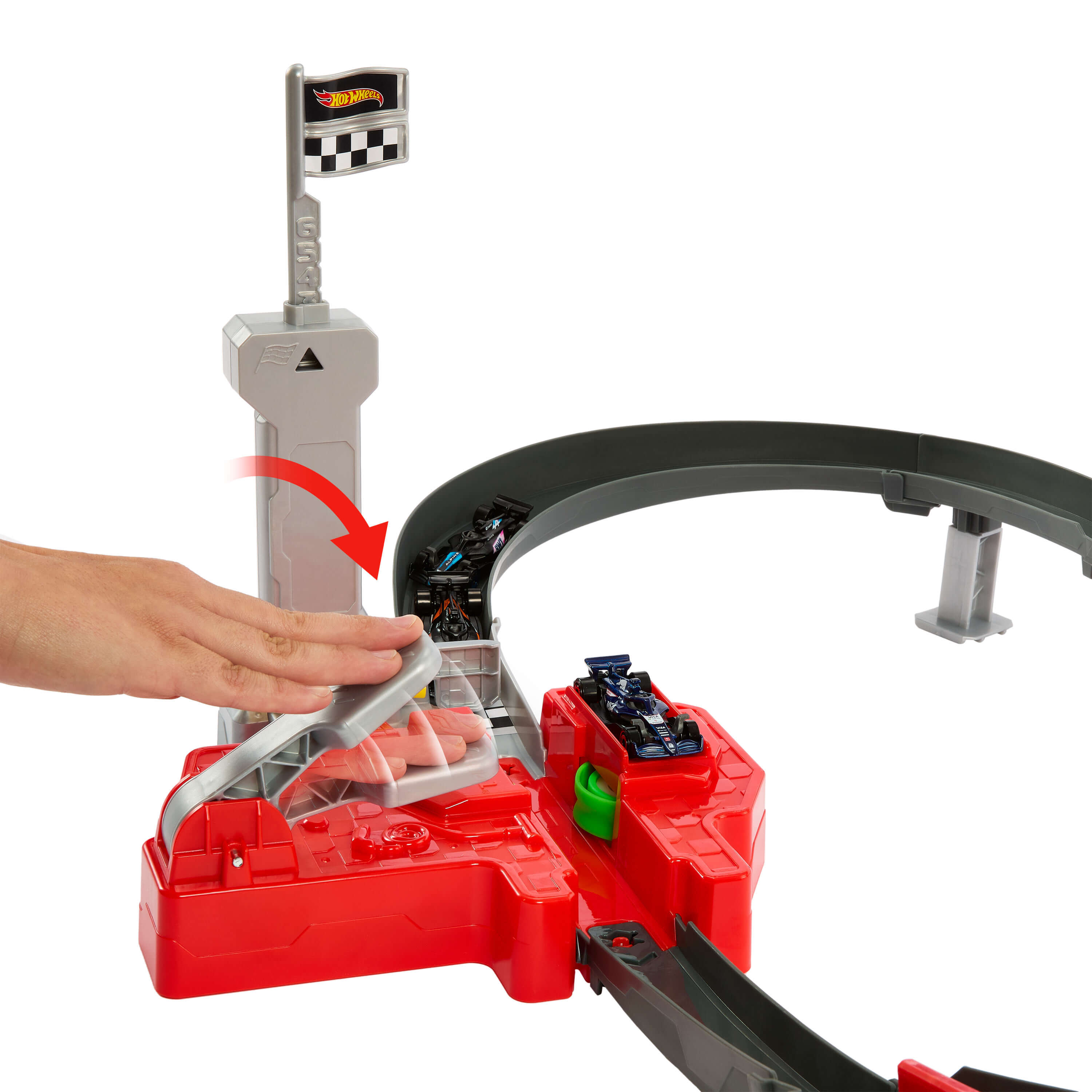 Un juego de pista de autos de juguete Hot Wheels con partes rojas y grises.