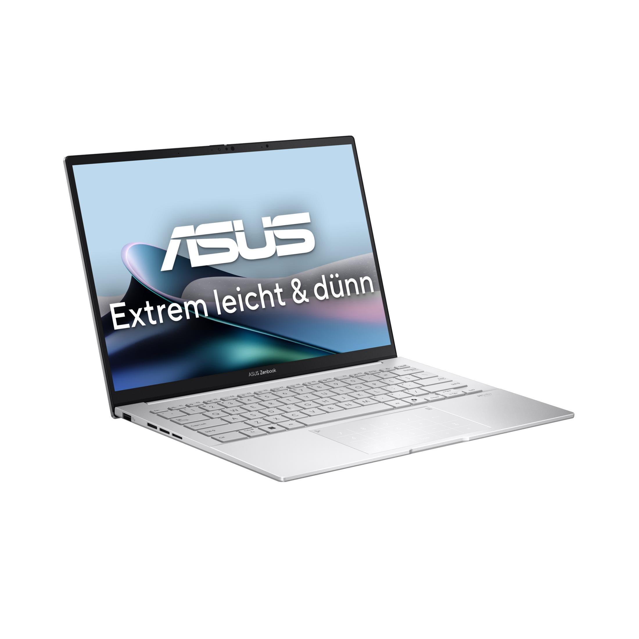 Un ordinateur portable Asus Zenbook argenté avec clavier et pavé tactile rétroéclairés.